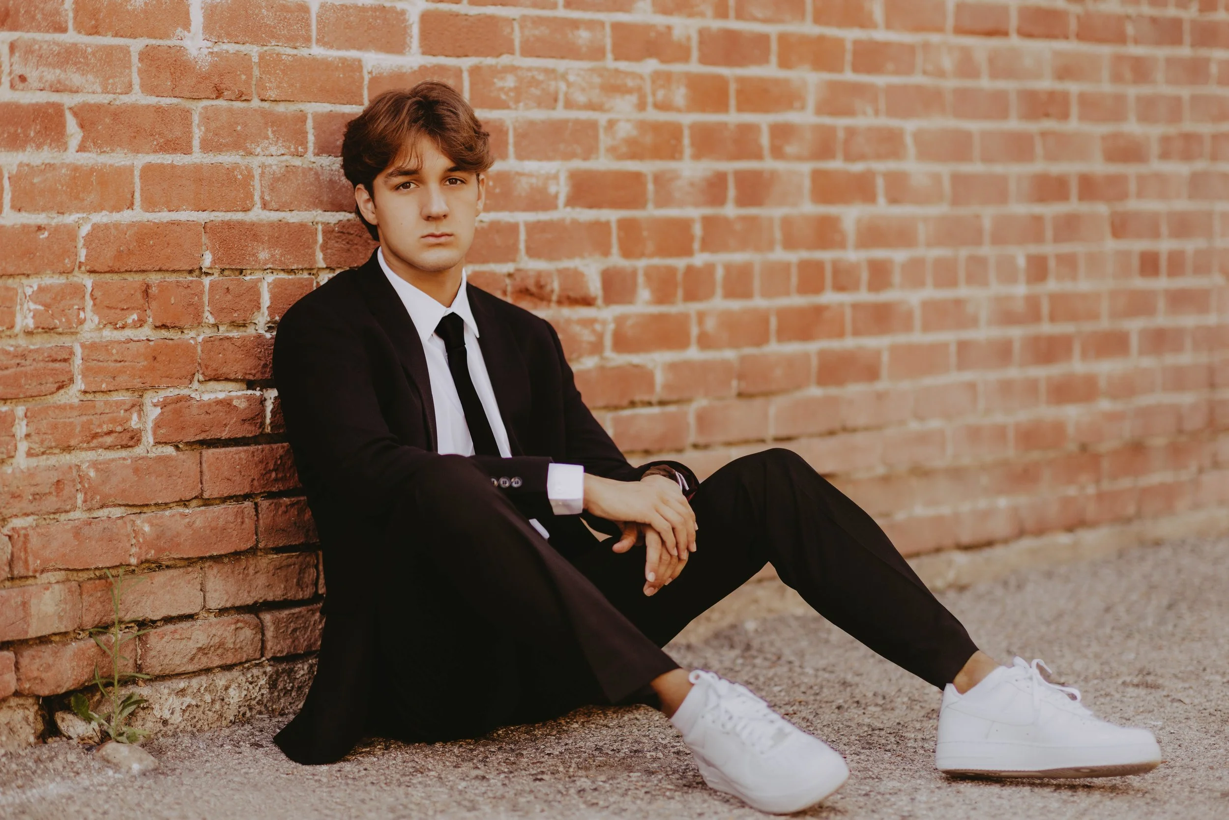  sitting senior boy poses 