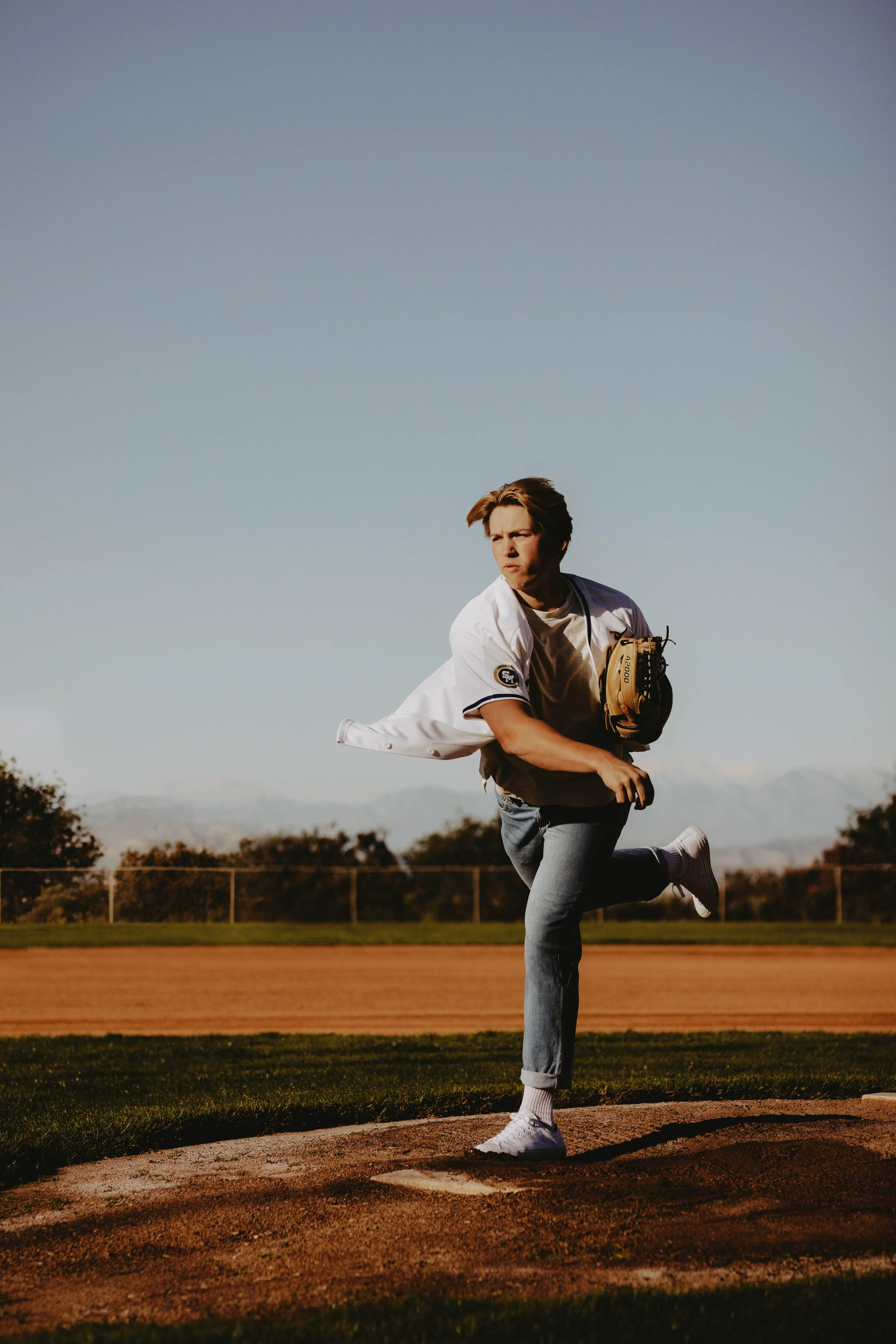  baseball senior boy poses 
