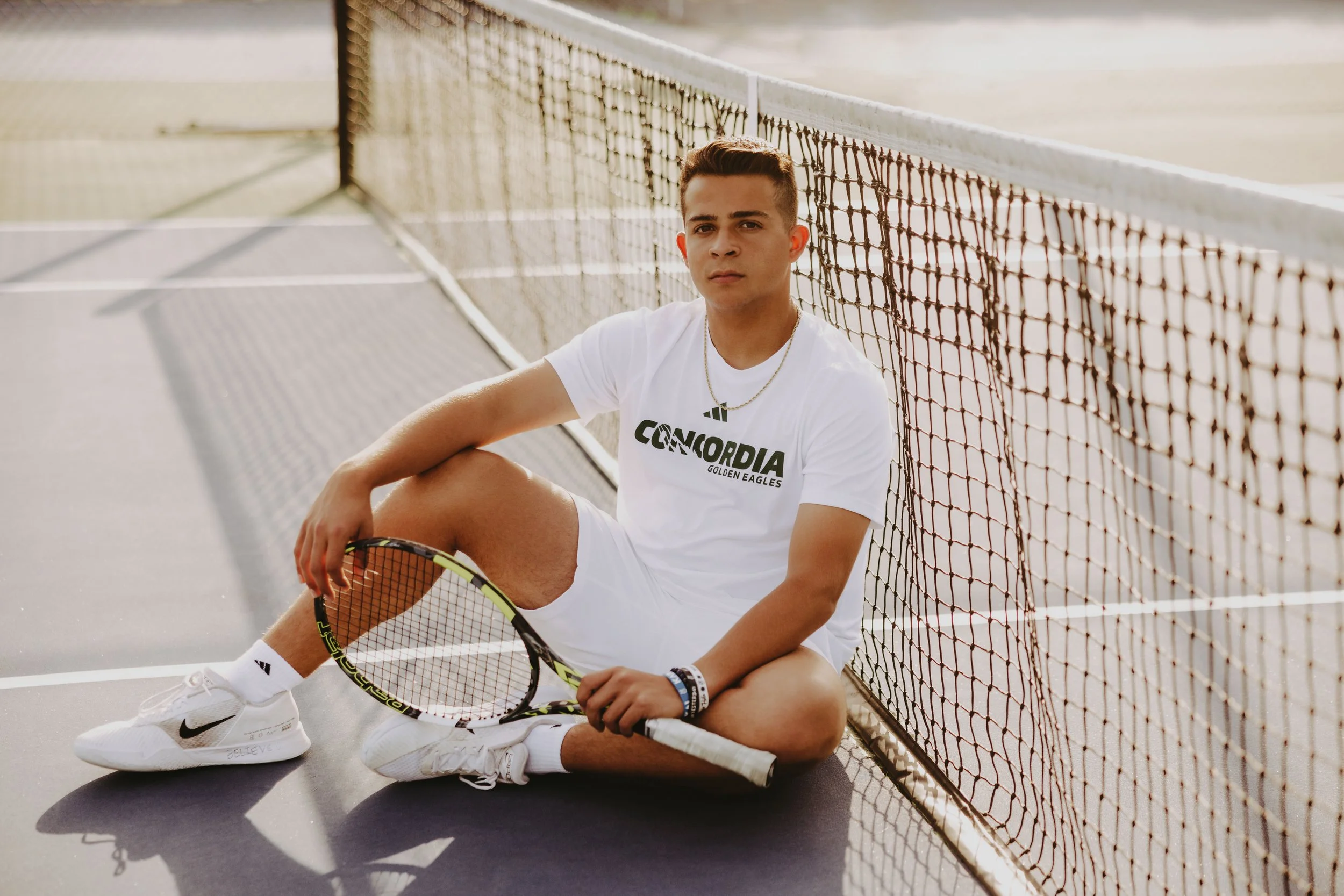  tennis senior boy poses 