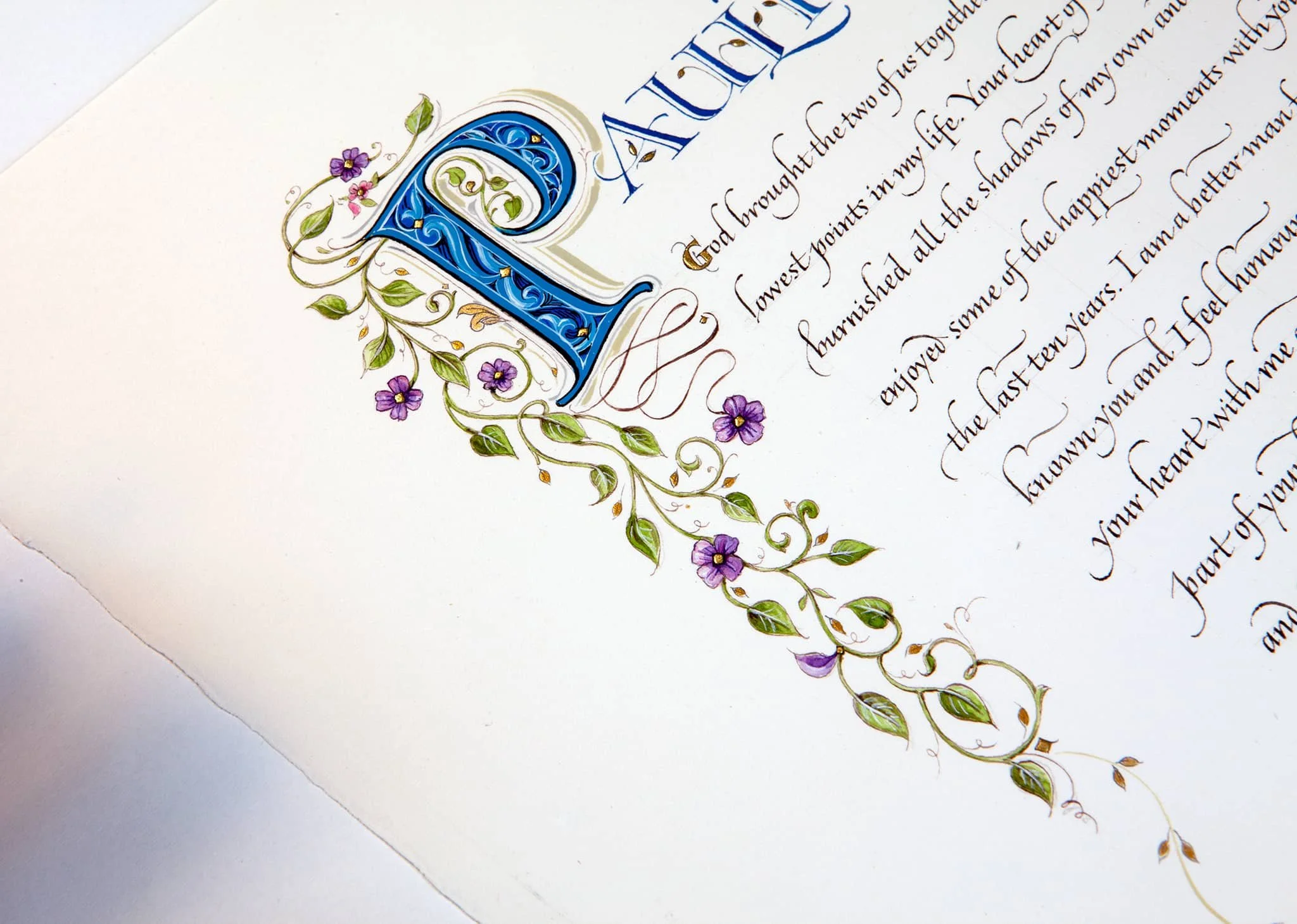 Illuminated/Decorated Initial letter design & Calligraphy by John Stevens. Pen calligraphy on Saunders paper.
