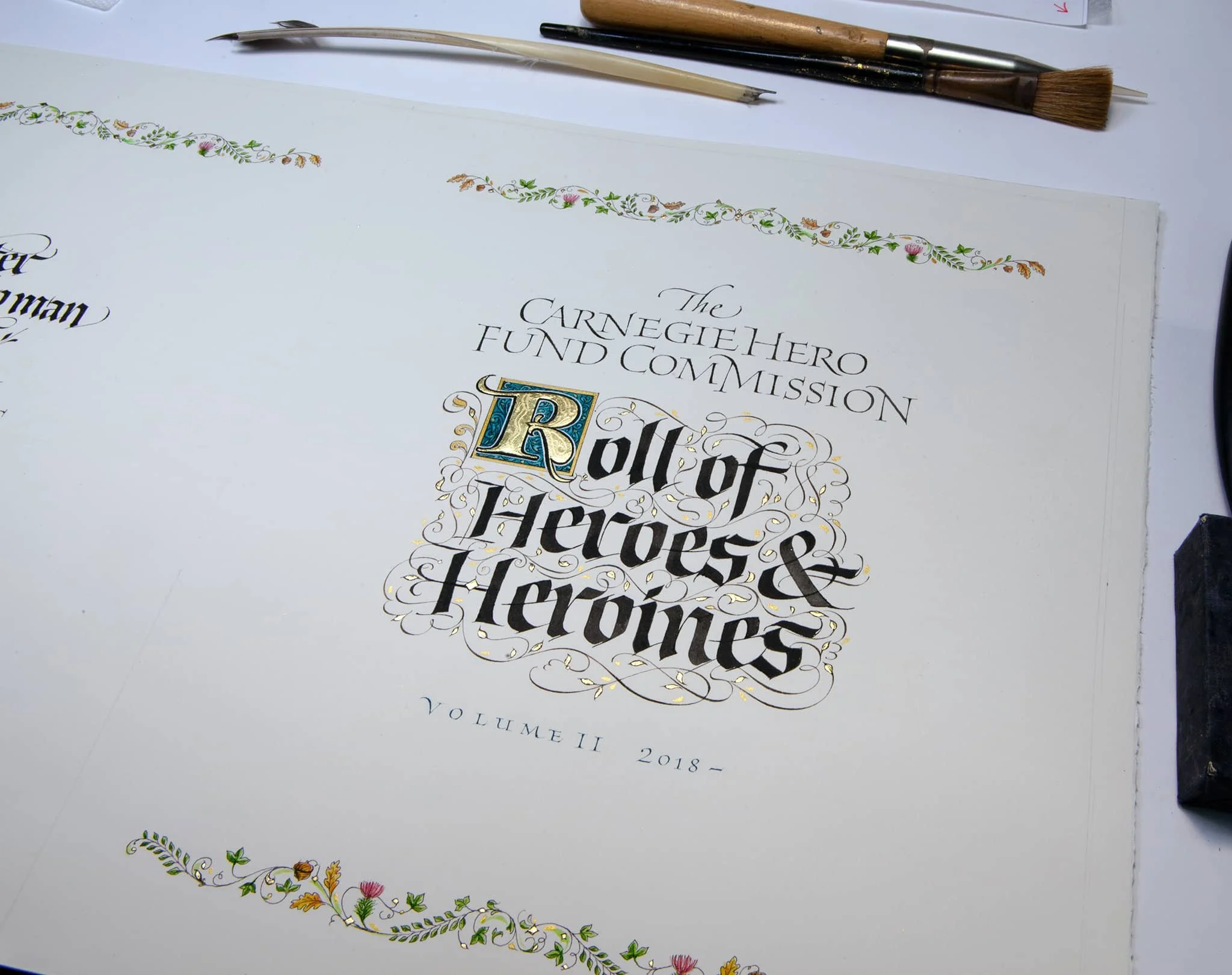 Title page (calligraphy & illumination) for the Carnegie Heroes Book. A book listing all of the Carnegie Heroes and Heroines.
