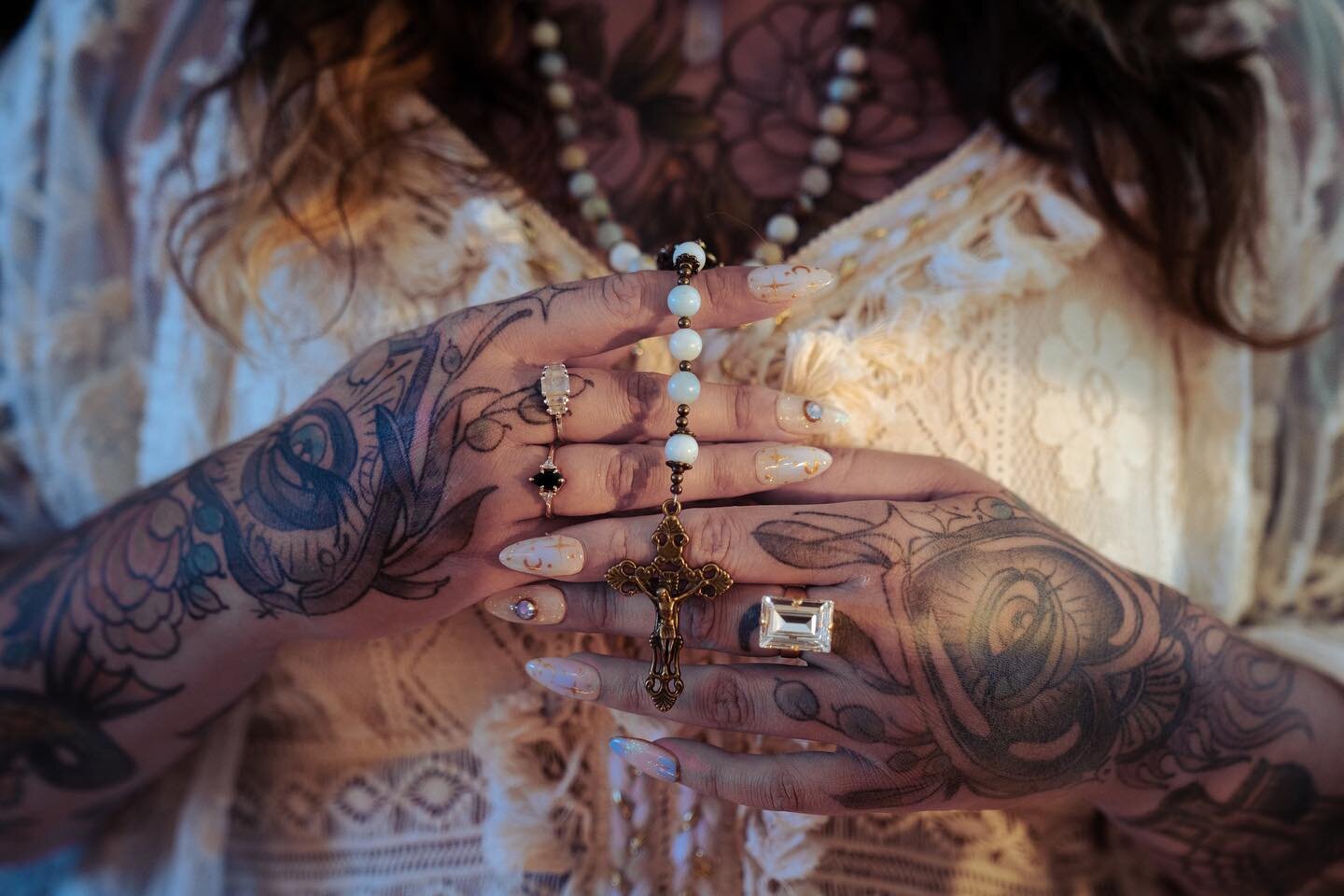 Happy Halloween, especially to: witchy femmes, sacred queers, stregas, and, of course, my ancestors. 🎃🦇✨
&nbsp;
📸 @queerheartthrob | LA Creative Portrait Photographer
&nbsp;
Image Description: A closeup of Melissa, holding her hands to her chest. 