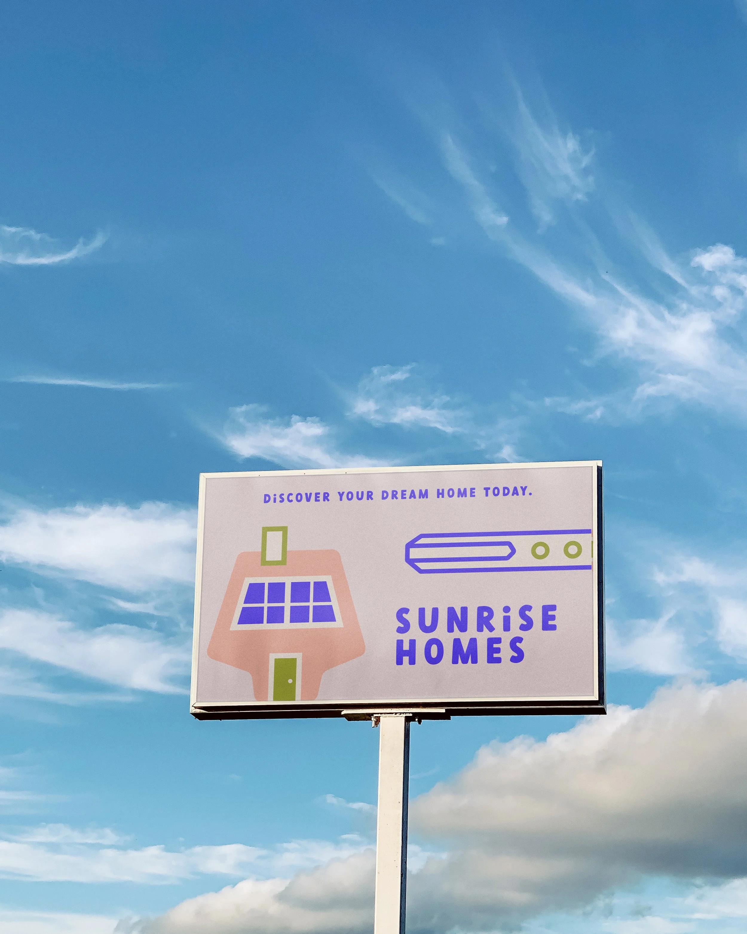 A billboard promoting Sunrise Homes with a stylized house featuring solar panels and a depiction of solar equipment, under a blue sky with wispy clouds.