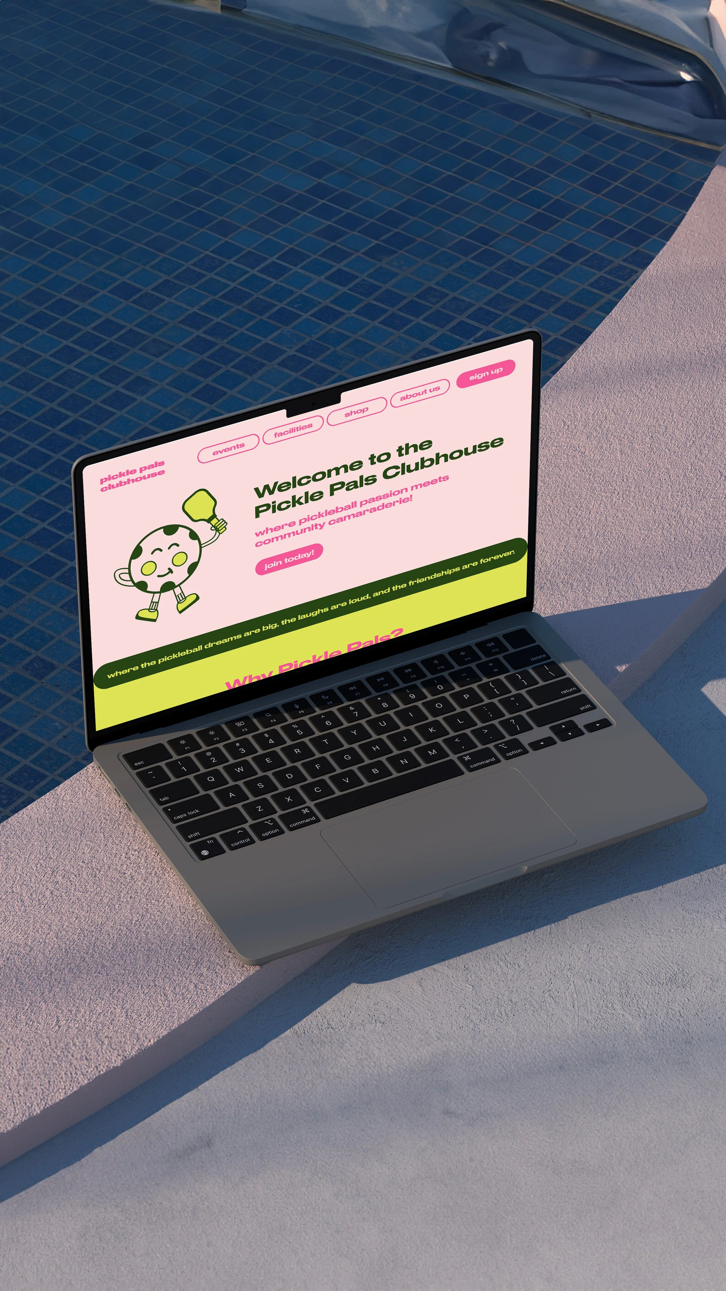 Open laptop on a pink ledge displaying the Pickle Pals Clubhouse website, next to a pool with blue tiles.