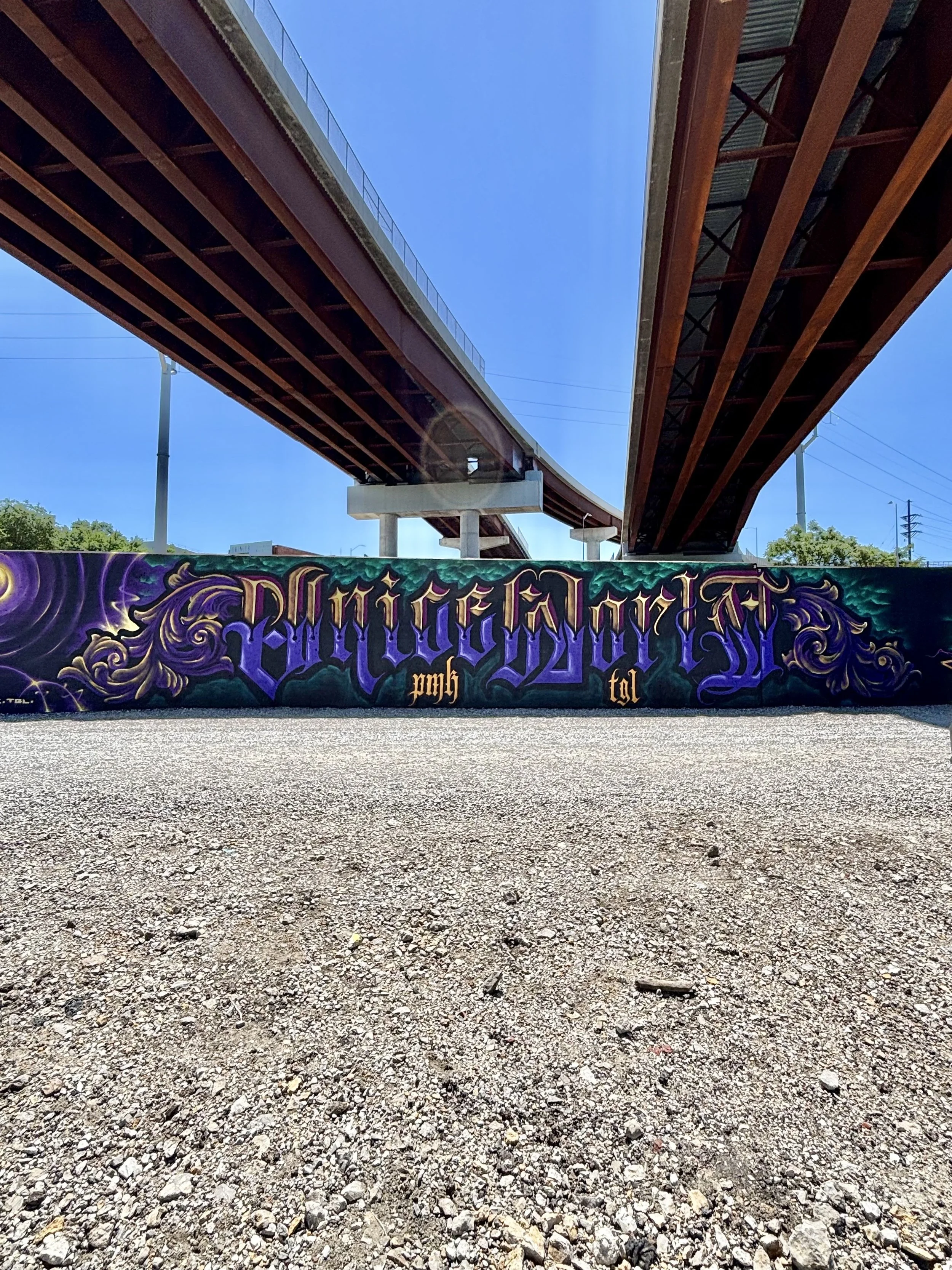 Painted during Paint Louis in Kansas City, this piece brought together beveled Old English lettering, Chicano influence, and a lowrider placa feel. Collaborating alongside Tox-M and Manic while surrounded by so much talent made this one an inspiring 