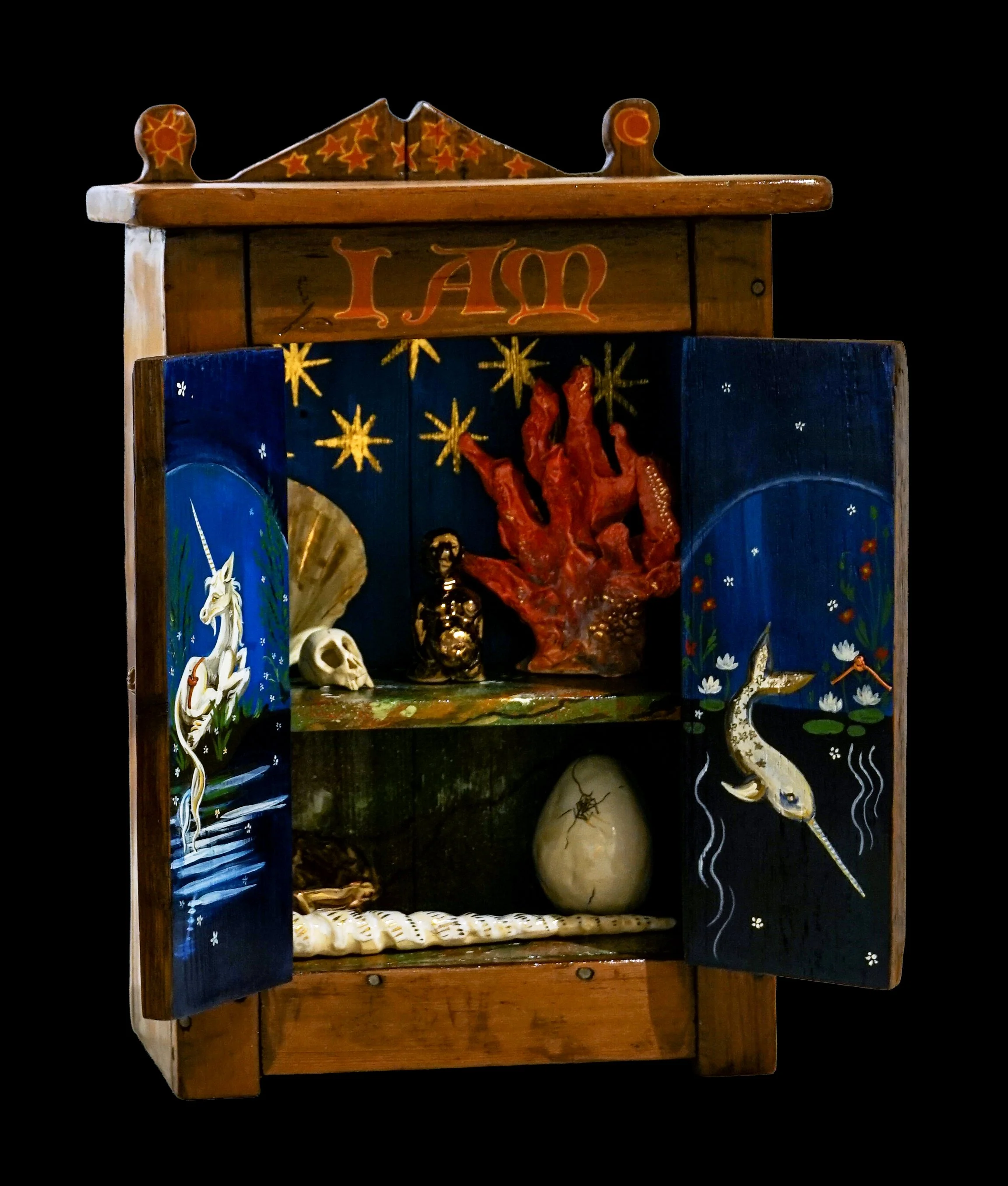 Memory’s Cabinet, 2026. Casein and gold leaf on wooden cabinet with ceramic objects, 19" × 14" × 8".