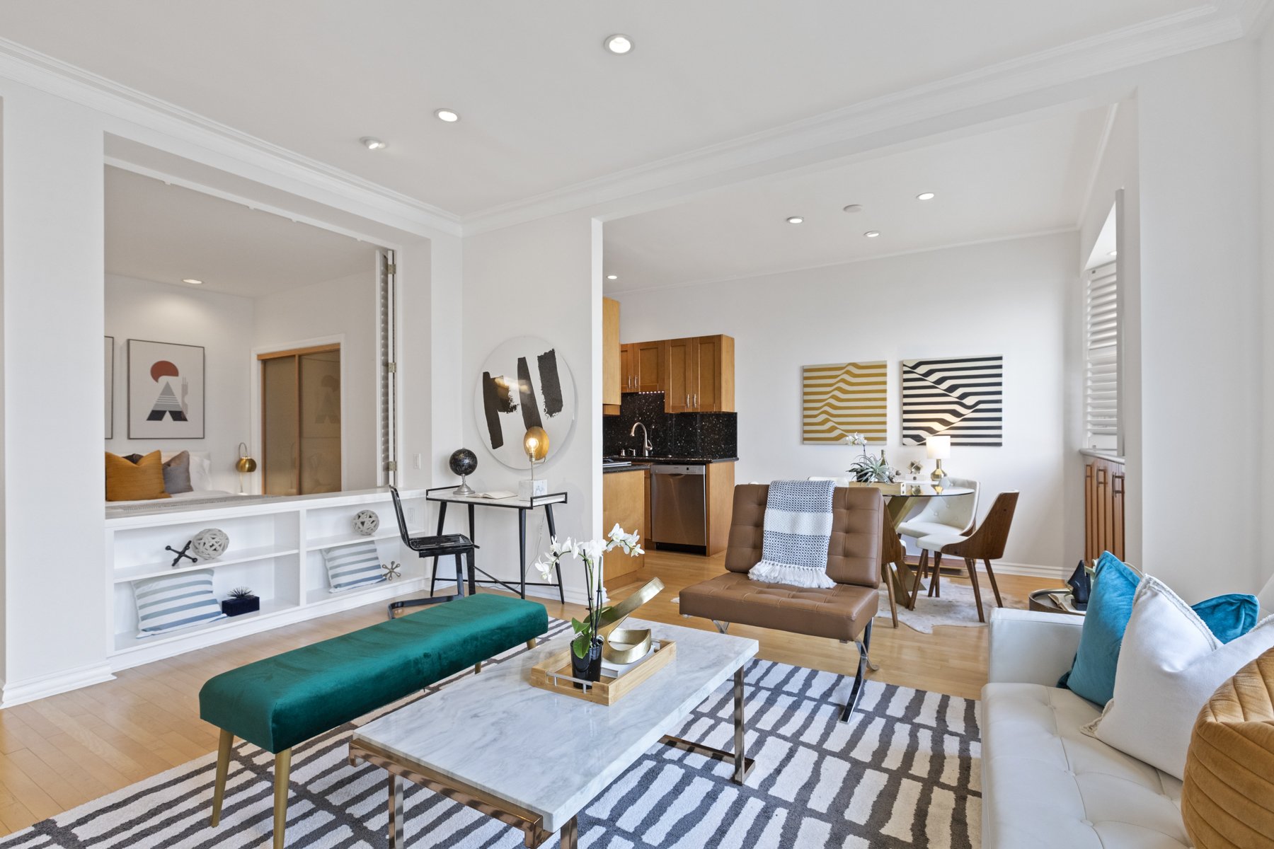 Real estate picture showing a living room and dining space.