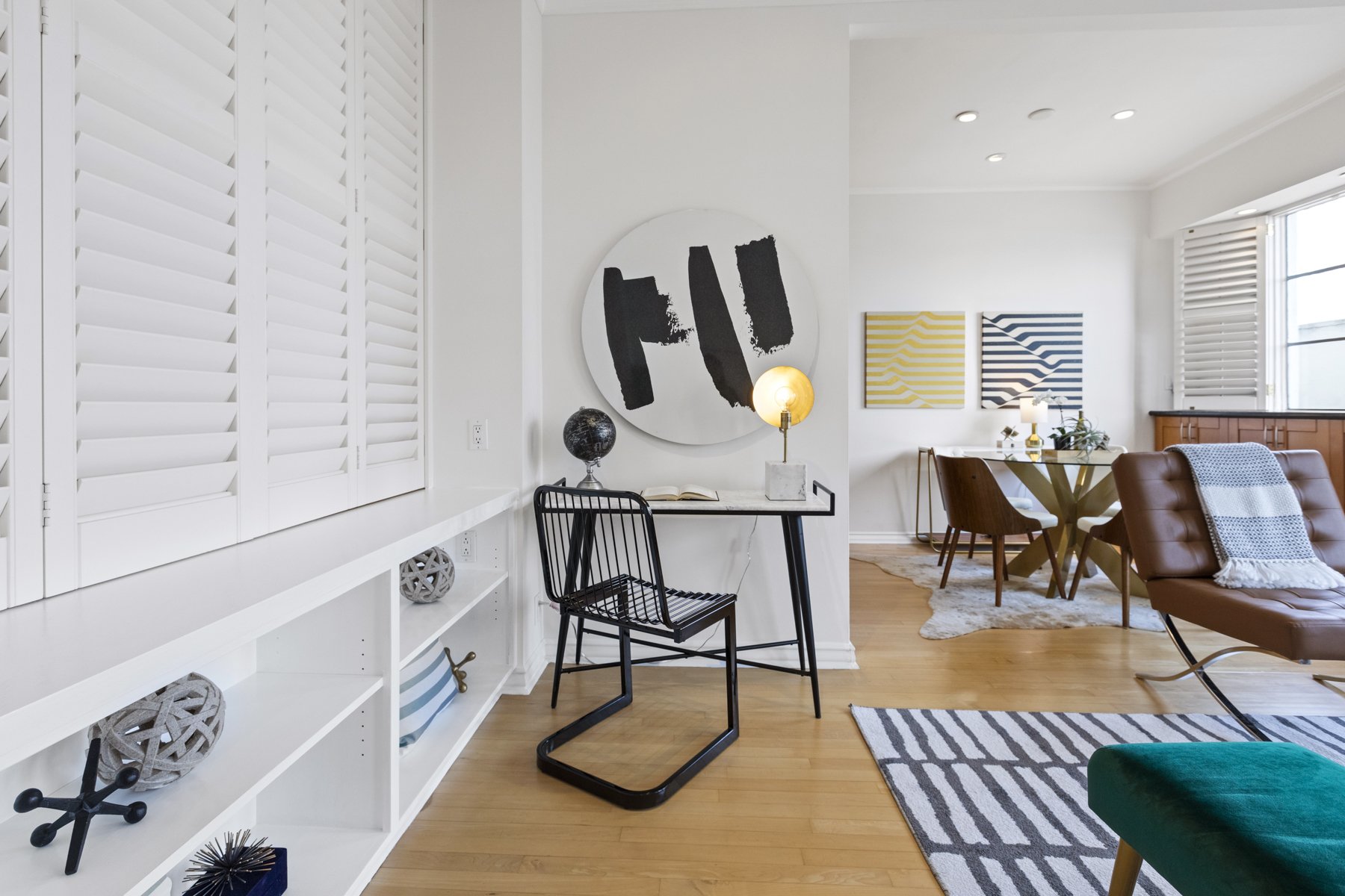 Real estate photography picture of a desk inside of a living room.