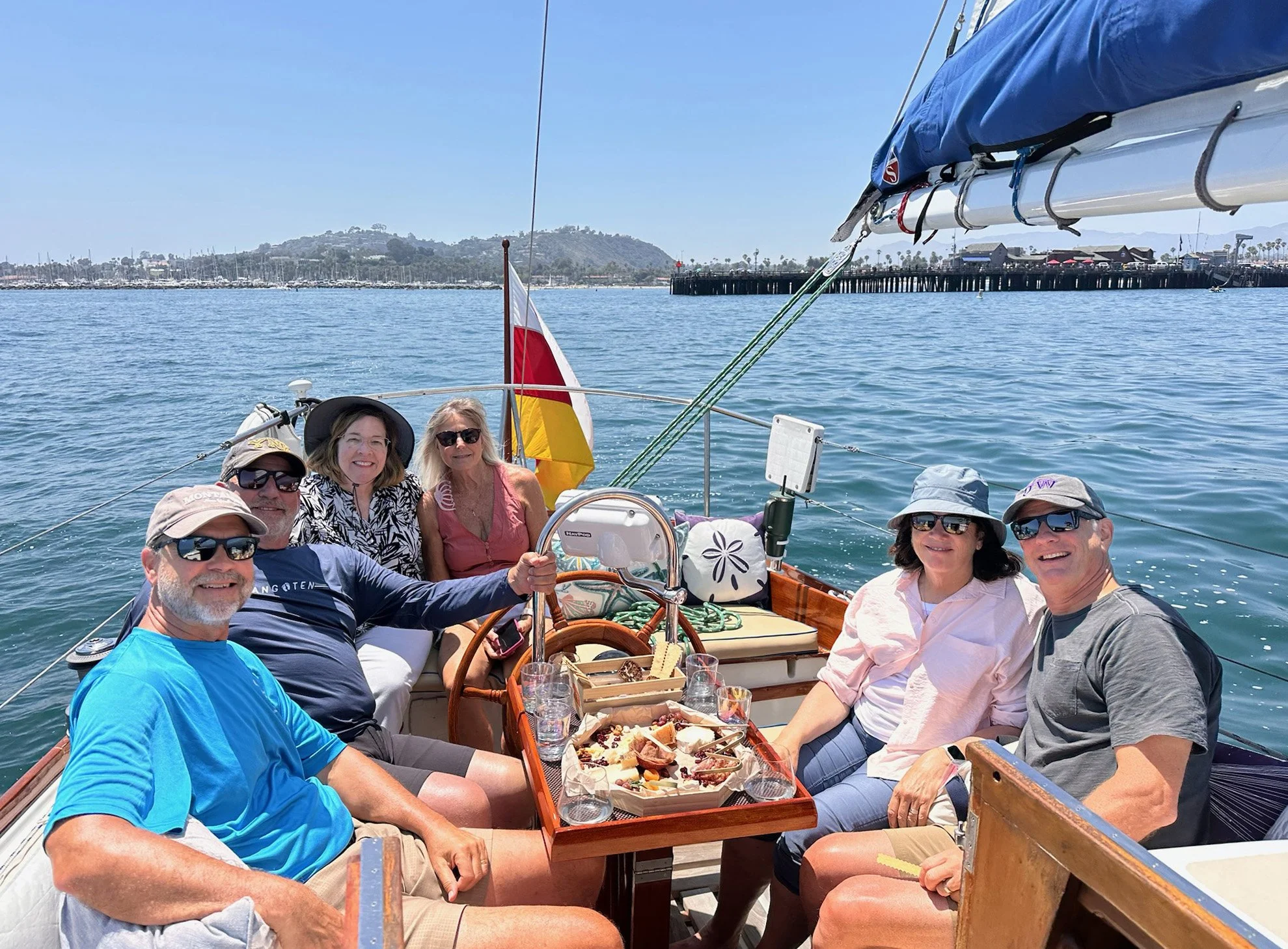 Private group enjoying a sailing charter aboard Kelpie in Santa Barbara Harbor.