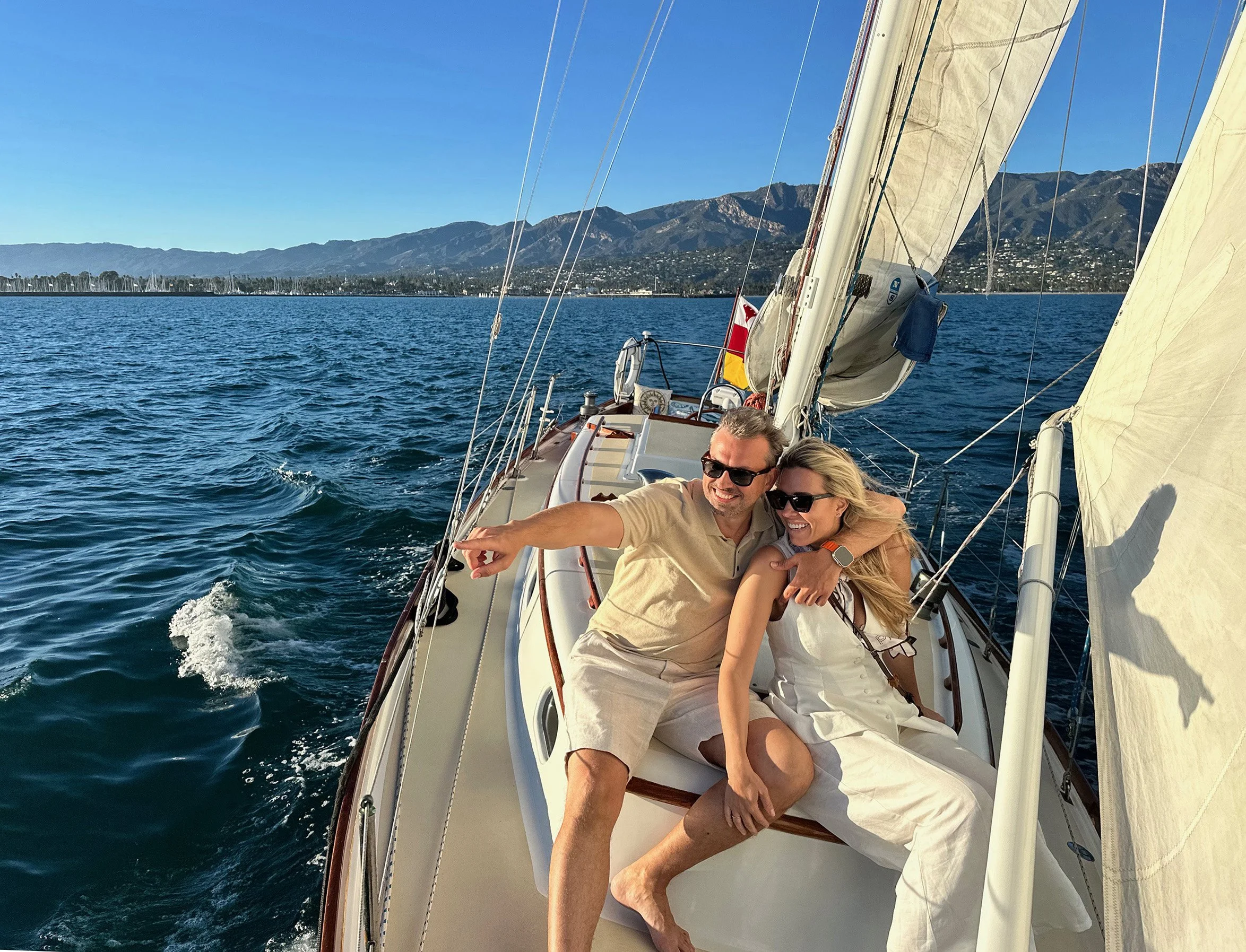 Couple enjoying a private sailing charter aboard Yacht Kelpie in Santa Barbara