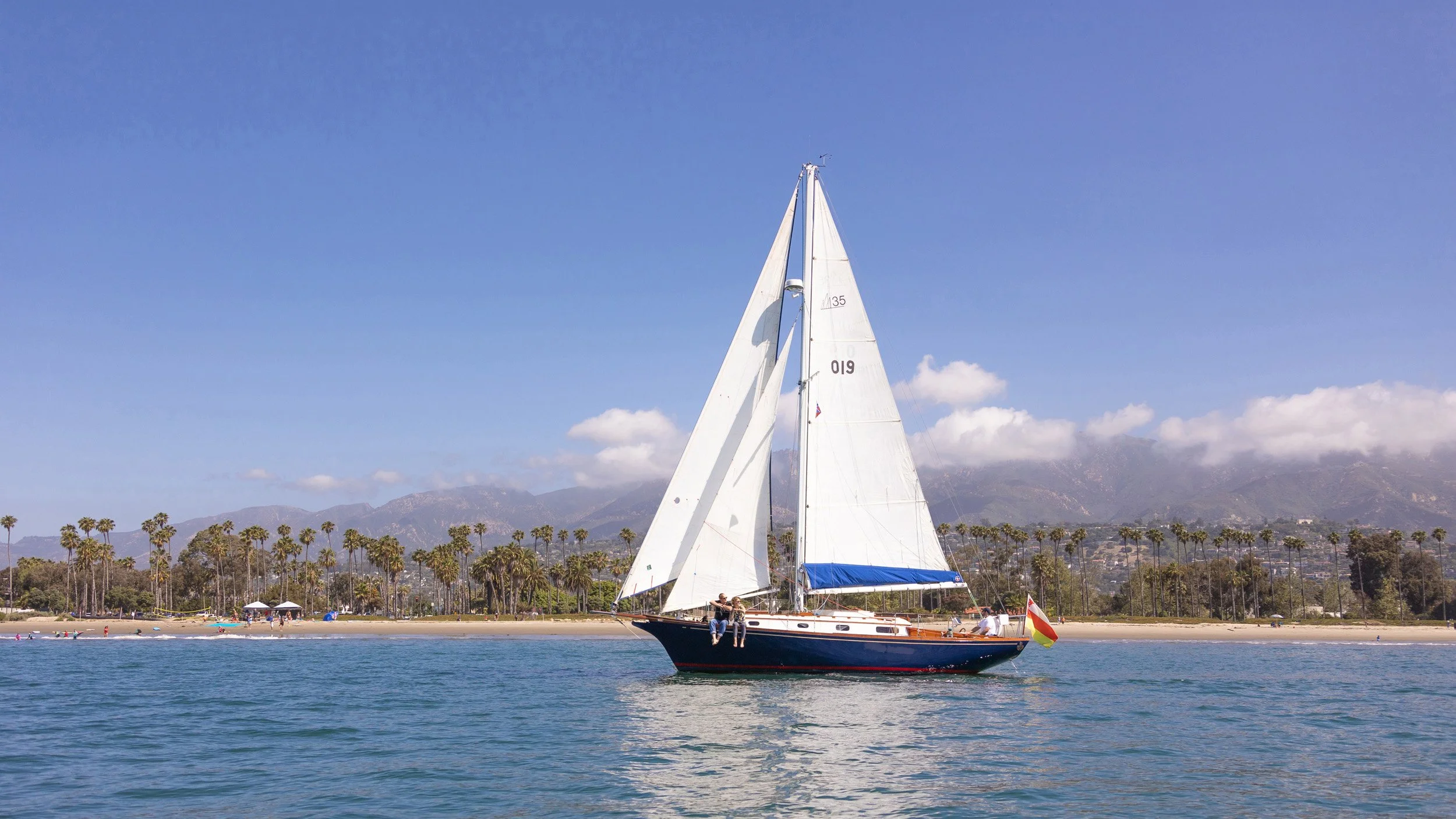 Kelpie sailing along the Santa Barbara coast during a private coastal sailing charter.