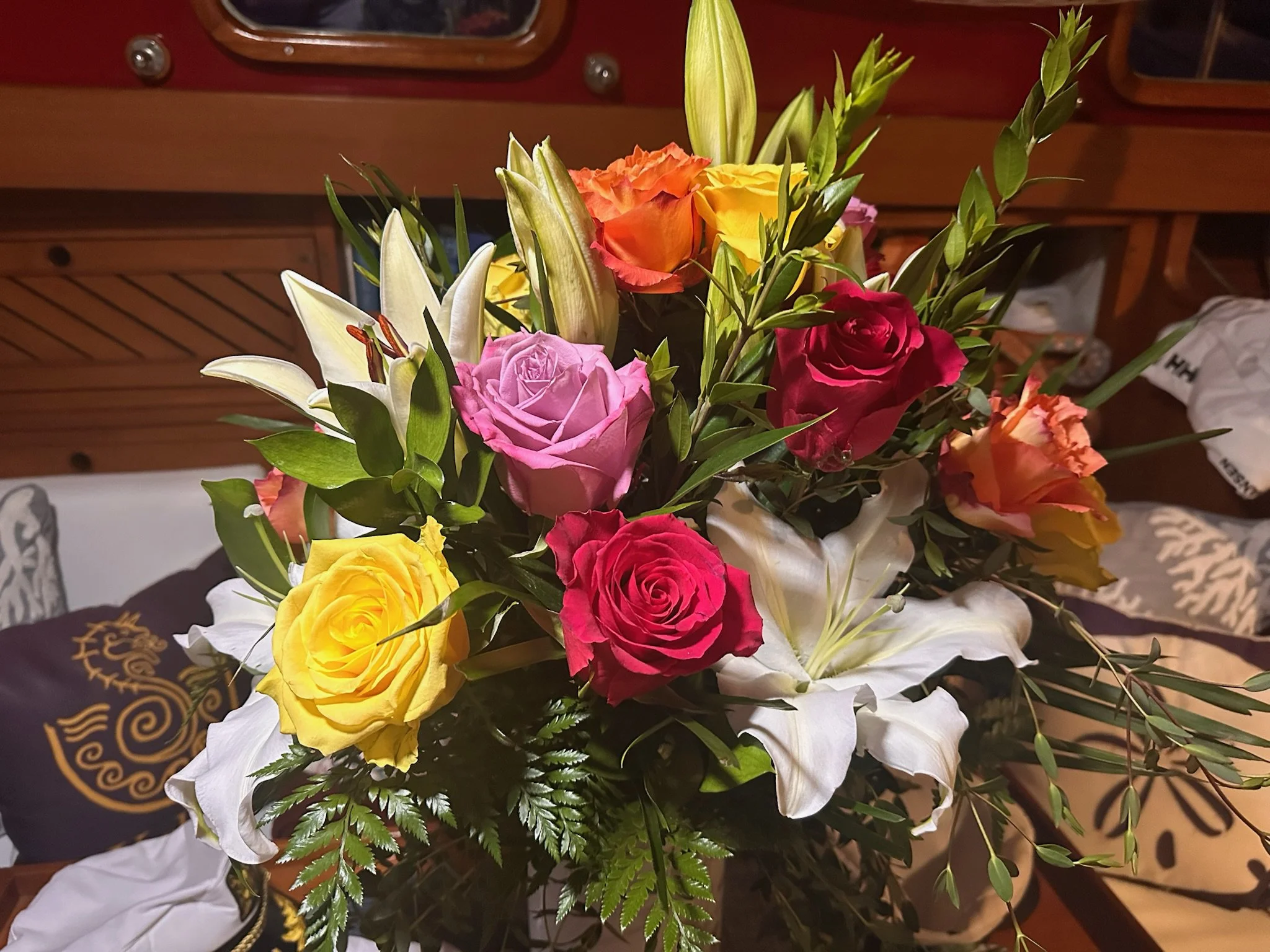 Fresh flowers prepared for a private memorial sailing experience aboard Kelpie.