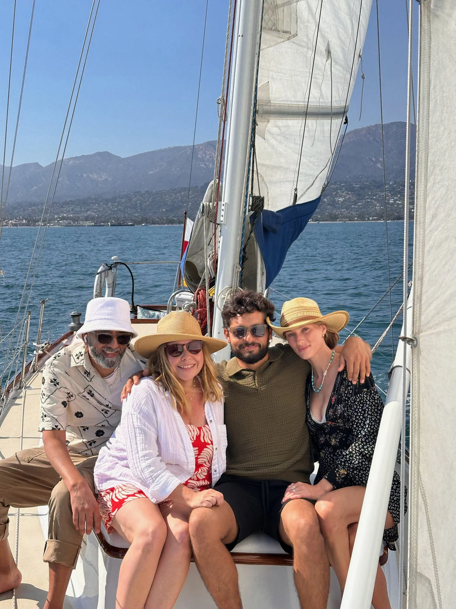 Four guests gathered aboard Kelpie during a private celebration sail along the Santa Barbara coast.