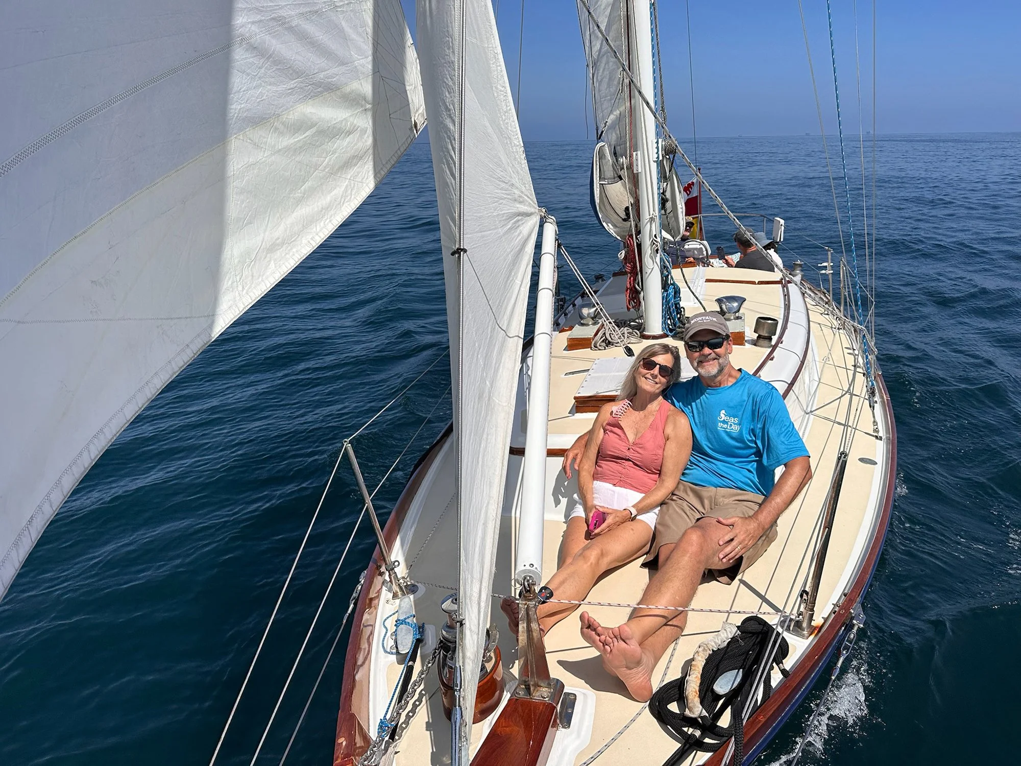 Guests enjoying a private sail aboard Kelpie with SunSwept Sailing in Santa Barbara