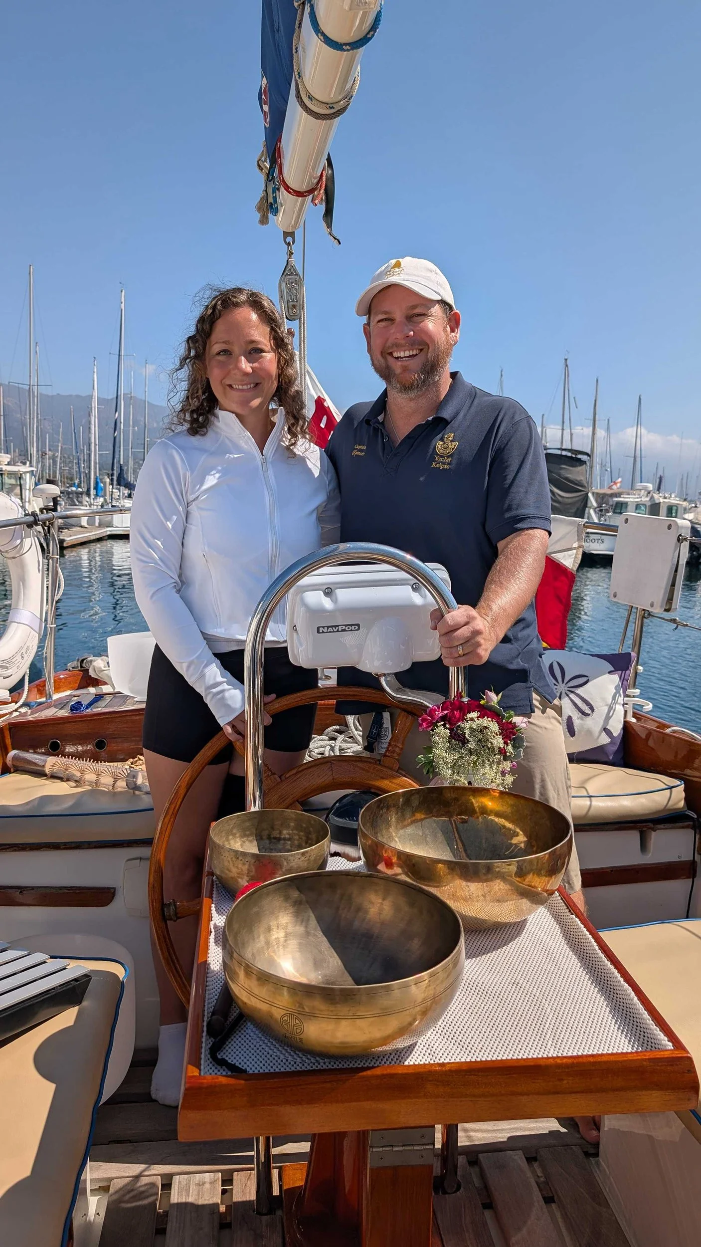 TBCF sound bath practitioner Becca Solodon with Captain Spencer MacRae aboard yacht Kelpie in Santa Barbara.