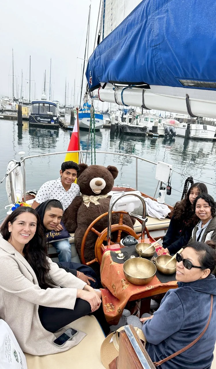 Teddy Bear Cancer Foundation families aboard classic yacht Kelpie for a Healing Sound Bath Sail in Santa Barbara.