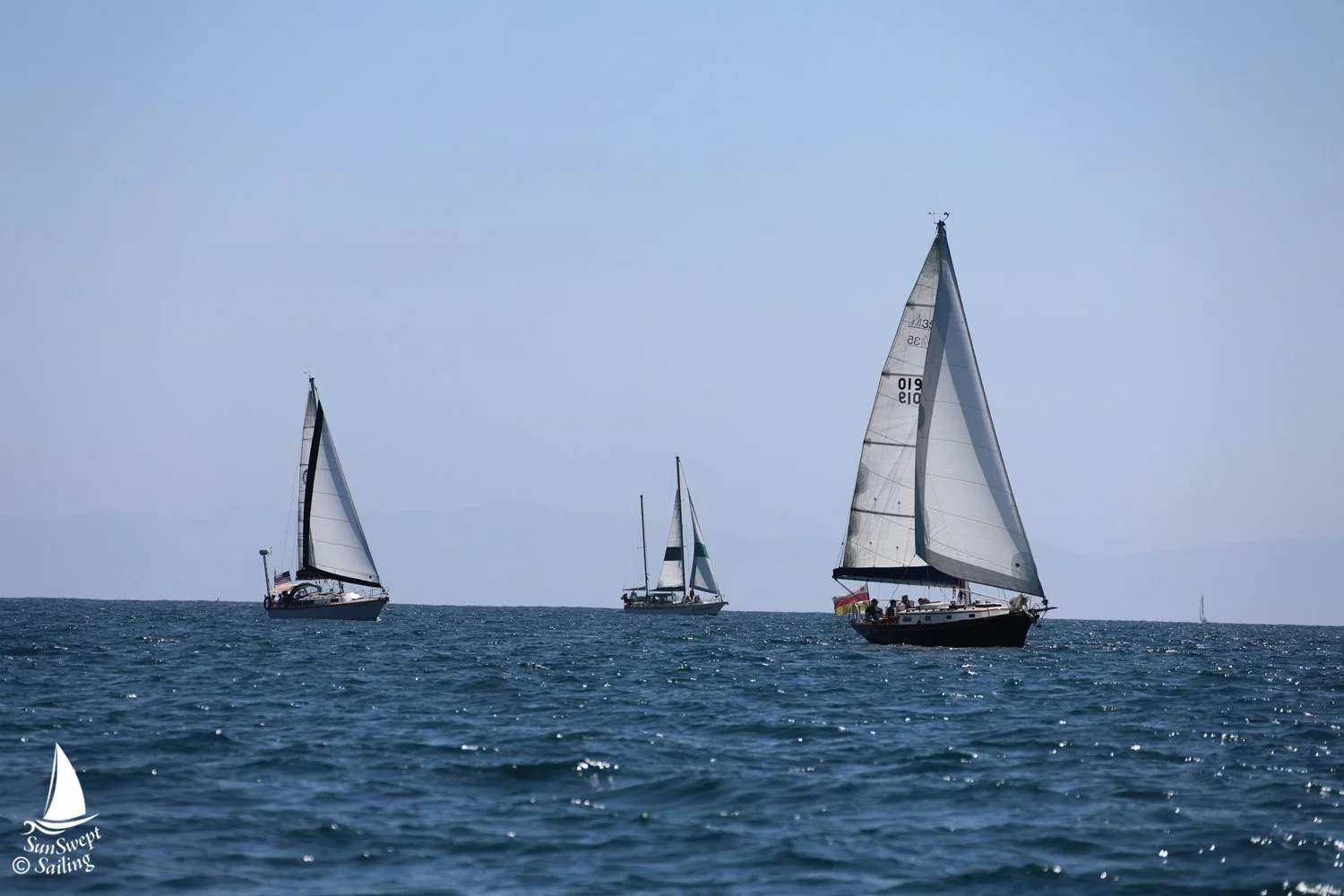 SunSwept Sailing Regatta Yacht Kelpie ahead