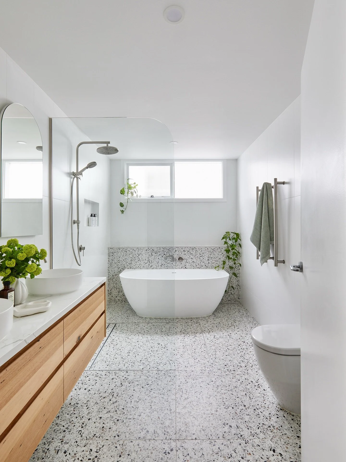 Bathroom Goals - Wet Room Edition 🛁💦

Our recently finished project in Ascot Vale is giving a glass of wine, dim lights, bubbles and zen vibes. 

We went for a fully integrated wet room layout, pairing terrazzo tiles with a wall mounted bath and fl