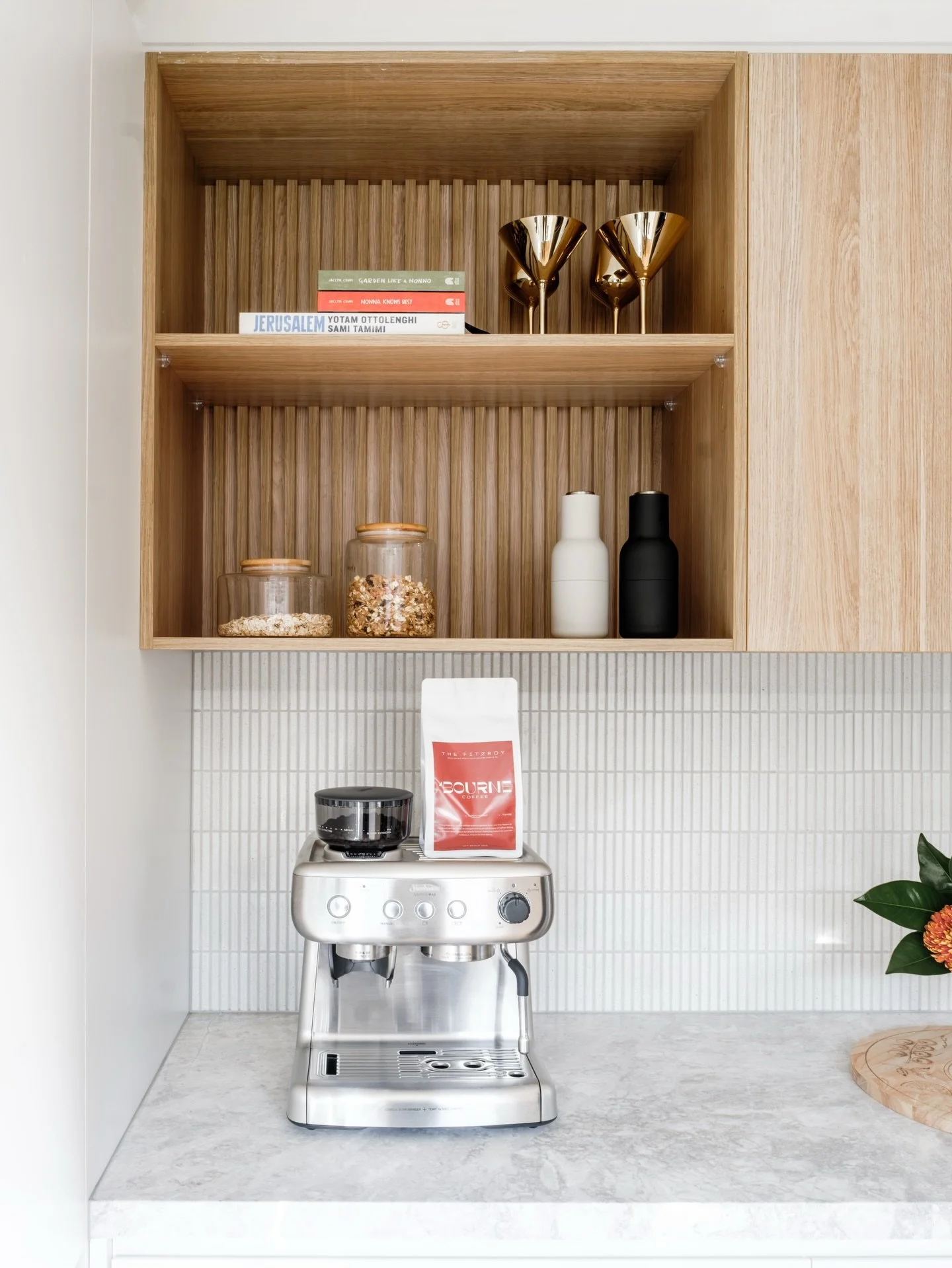 The one joinery detail that makes this kitchen feel custom. 🔨

The recessed shelf with timber batten backing adds warmth, texture and depth, while still being beautifully functional.

Think of it as the icing on the cake.
The jewellery to the finish