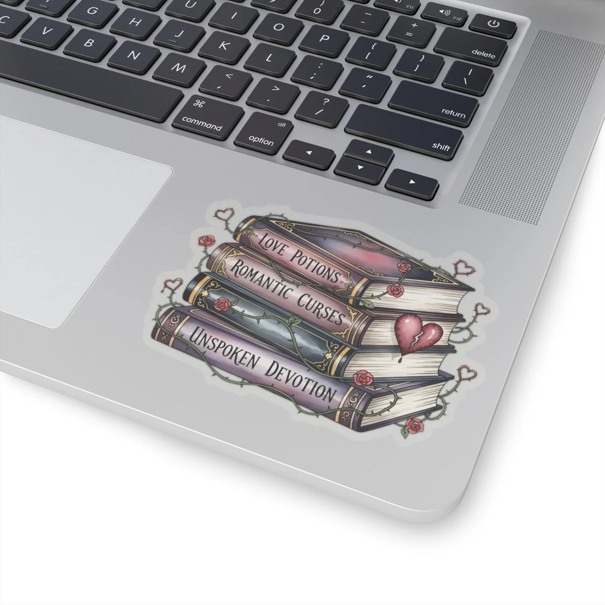 Romantic Book Stack; 'Love Potions, Romantic Curses, Unspoken Devotion' sticker