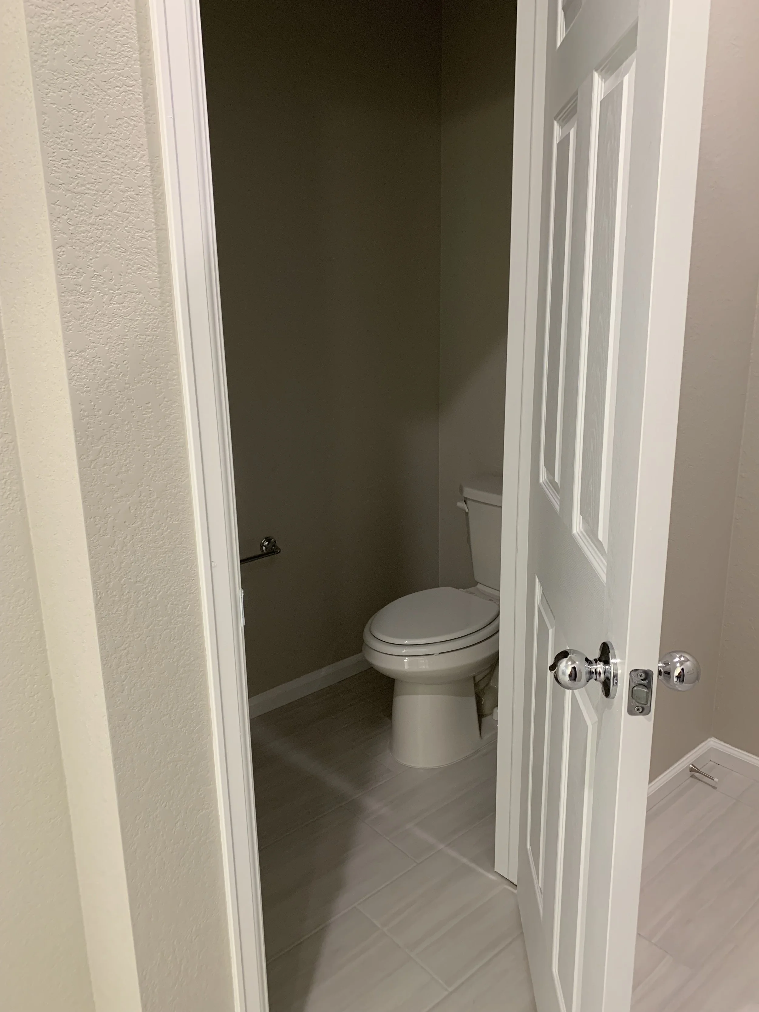 bathroom primary toilet.jpg