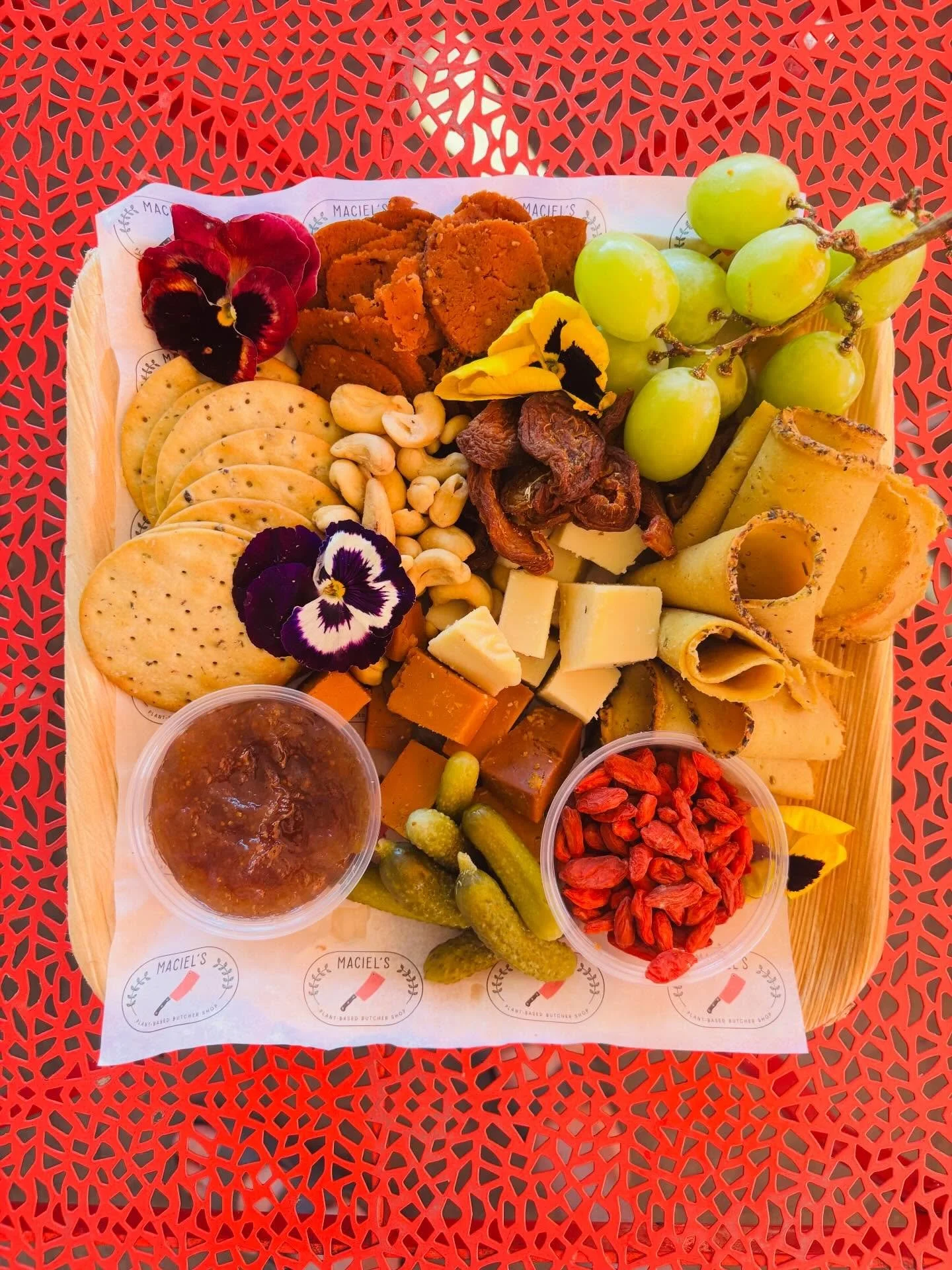 Only @coachella! The Board - our house-made herb turkey and salami, smoked cheddar and Gruy&egrave;re from @rebel.cheese, grapes, cashews, cornichons, apricot jam &amp; crackers 😎😋🤤🌱🌵

#charcuterie #charcuterieboard #plantbased #vegan #coachella