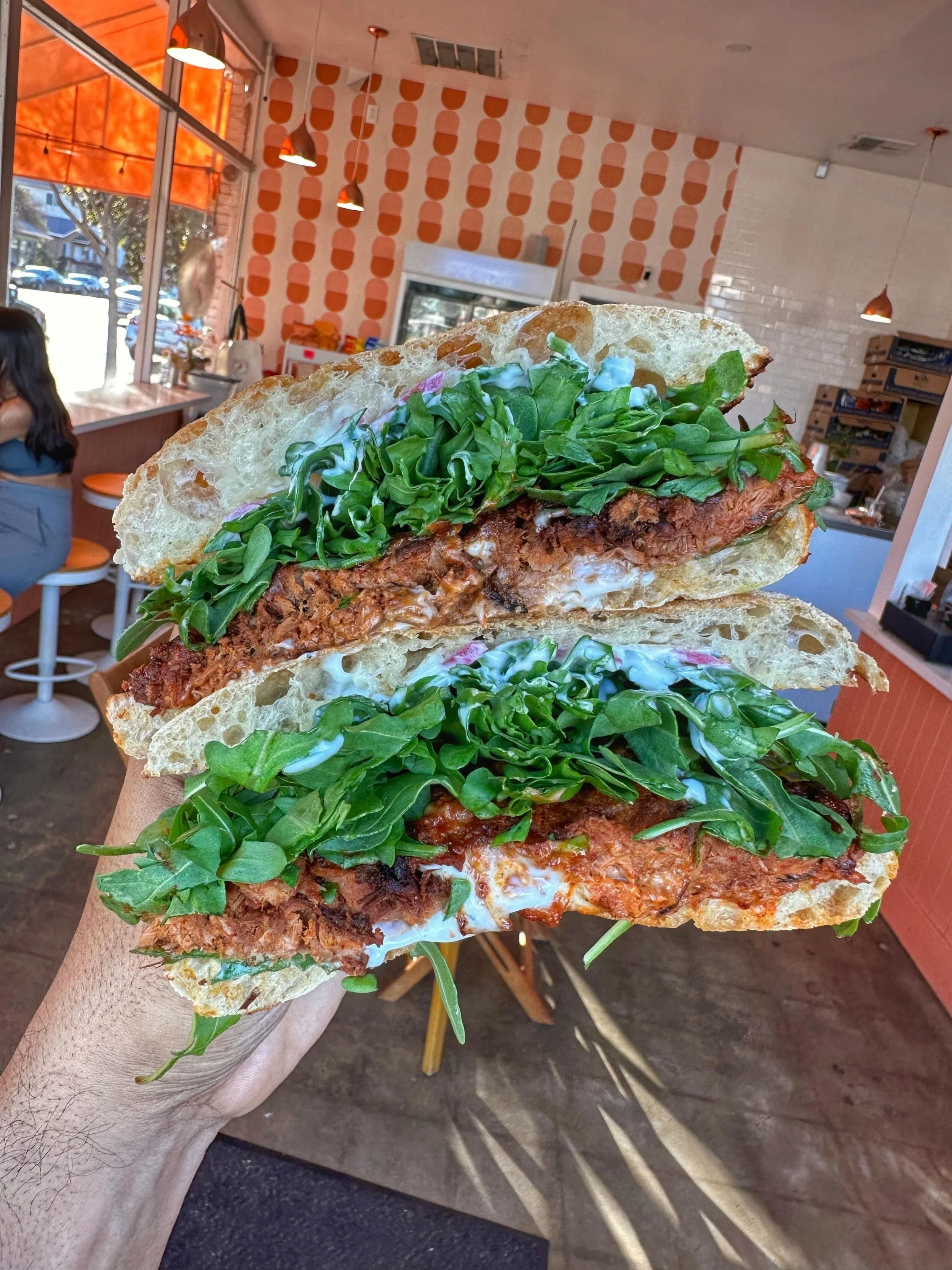 The Flores - Mexican adobo ribs, pickled onions, arugula &amp; mayo on toasted ciabatta 😋🌱

#plantbased #pulledpork

📷 @aveganandher