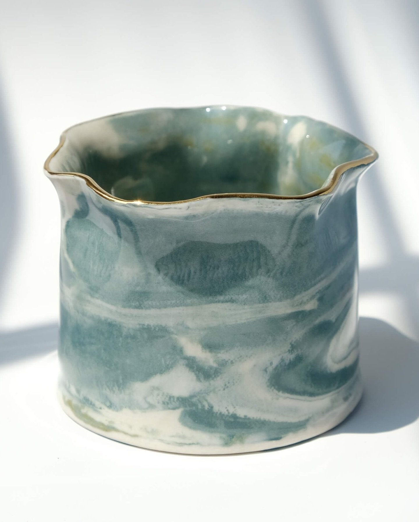 From bisque to finished piece. The way the light hits the porcelain makes the sage green look different throughout the day - sunny vs cloudy, it&rsquo;s like two different pieces.