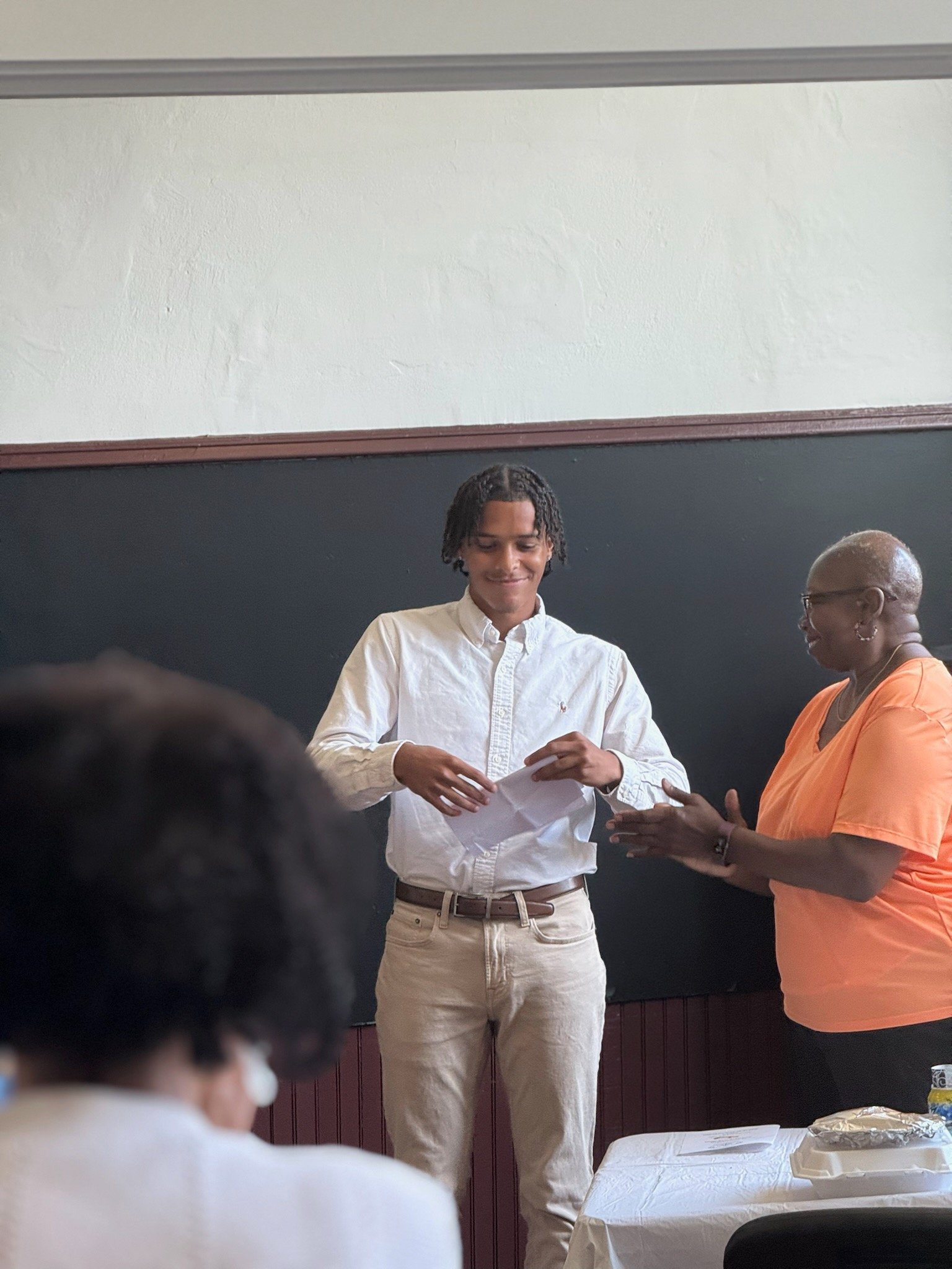 Union Grove Baptist Church sponsor, KHF Board member Carmelita Wood with Darrius Tyler