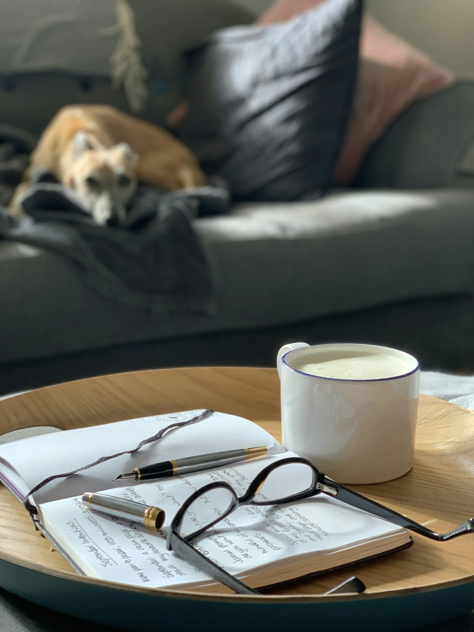 therapist notebook and glasses with coffee