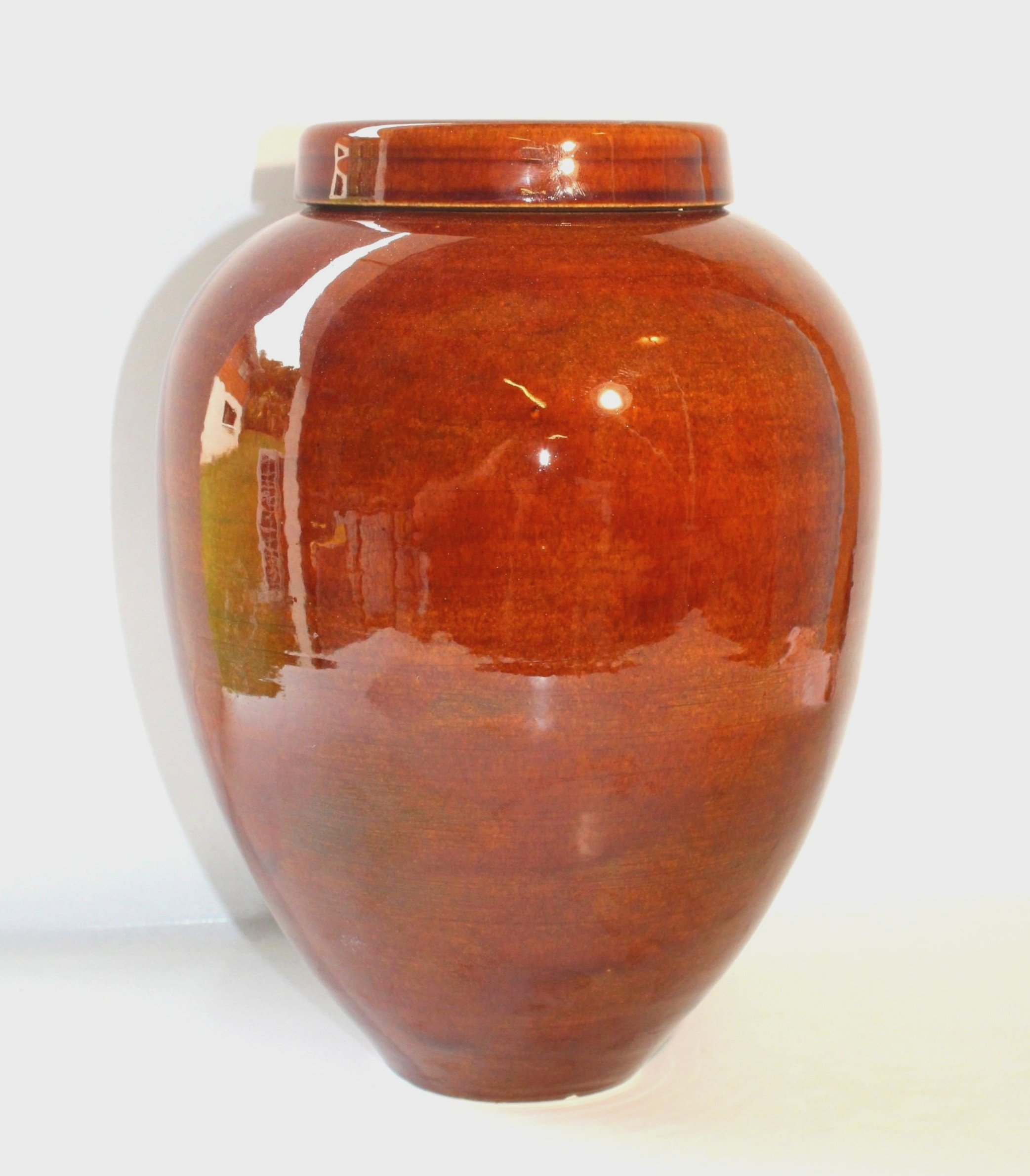 Bespoke ceramic urn with a hand-painted design, personalised to honour a loved one with a unique and meaningful tribute.