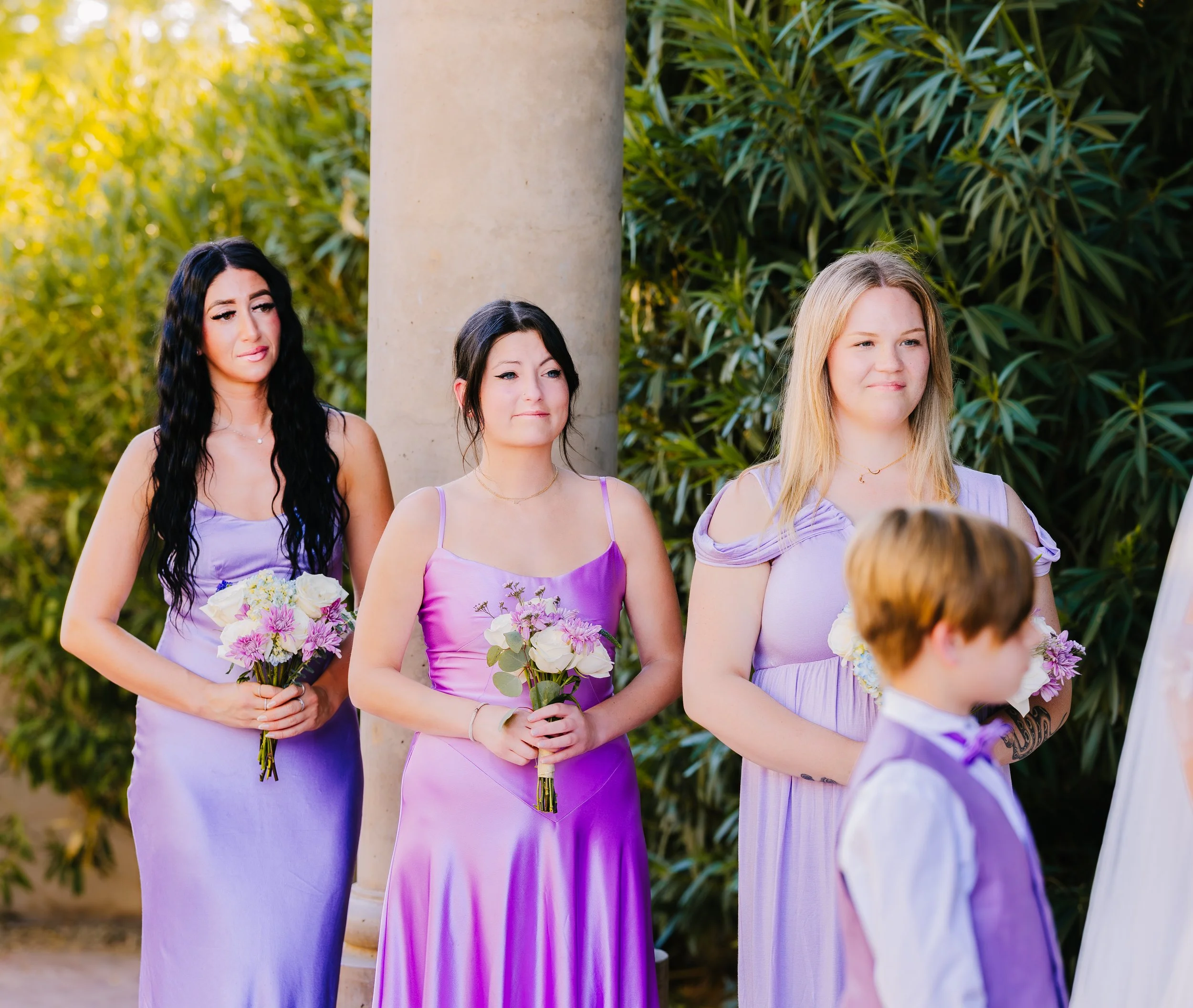Bridesmaids in lavender dresses holding bouquets during a wedding ceremony outdoors. affordable wedding photographer phoenix az
desert wedding photographer phoenix
phoenix elopement photographer
country western wedding photographer phoenix