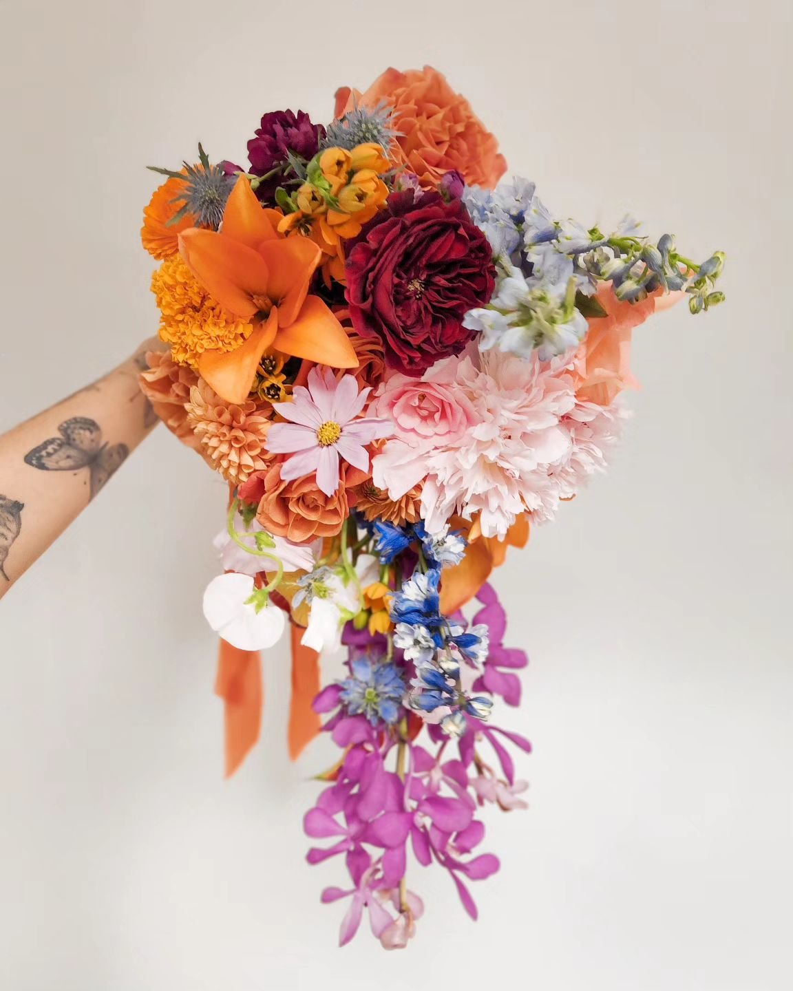 A super colourful bridal from a few years back ❤️🩷🧡🩵

I loved this bouquet, and looking back, it is still one of my favorites! The groom grew up around tropical blooms and they wanted to incorporate some of that colour into their bouquet, but with