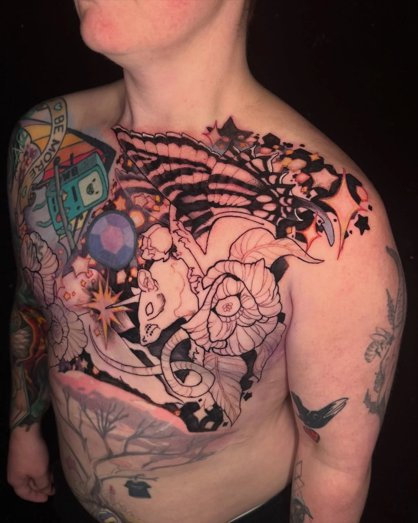 top surgery scar cover up (+ regular cover up) in progress. some spicy placements lately! but i can&rsquo;t wait to get more into colour with this faericorn rat &amp; pawpaw flowers. the wings are based on zebra swallowtails, whose only host plants i