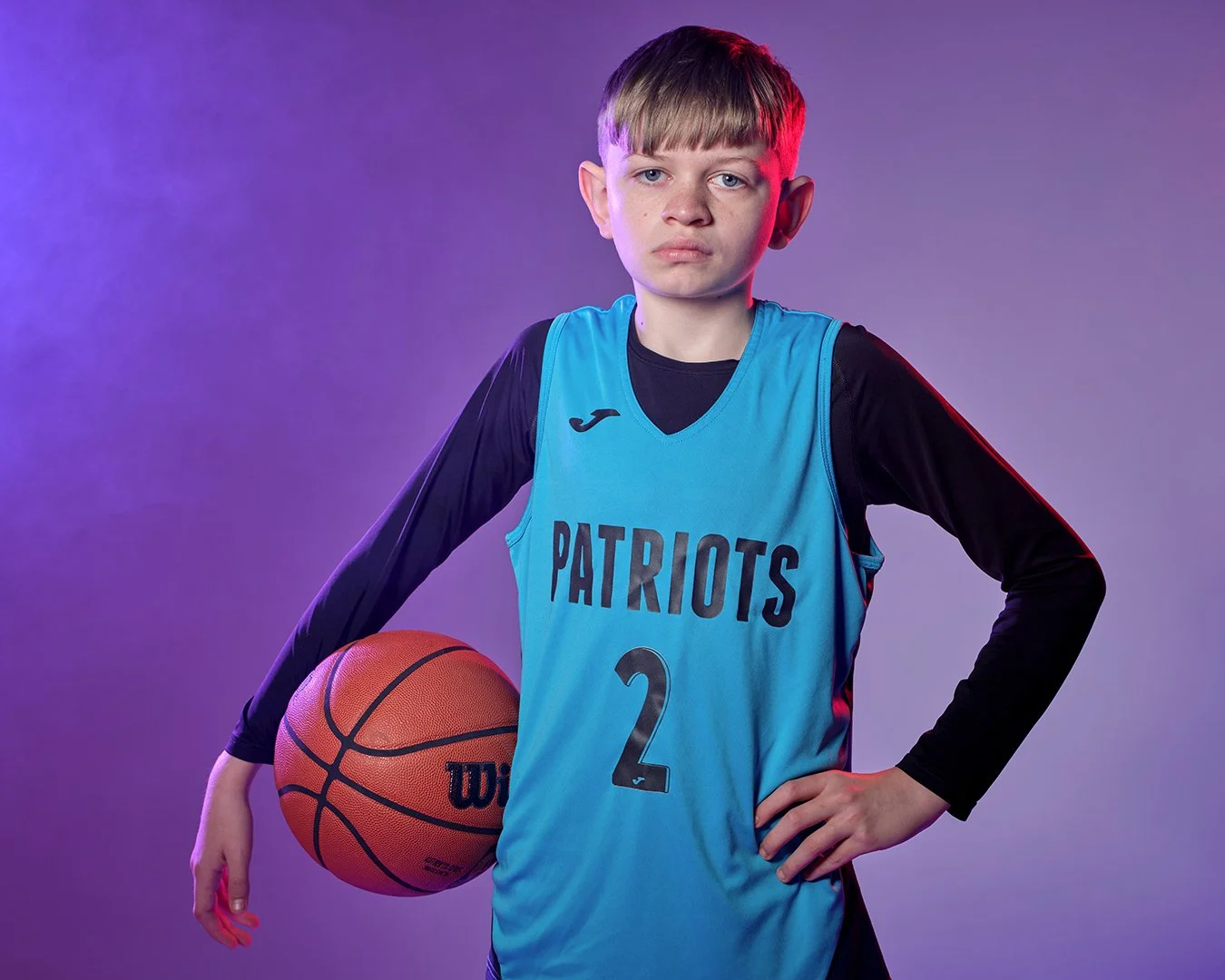 Young Basketball player in creative lighting.jpg