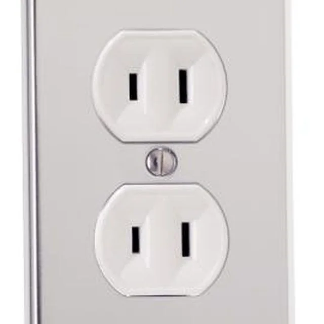 How An Electrician Turns A Two-pronged Outlet Into A Three-pronged Outlet