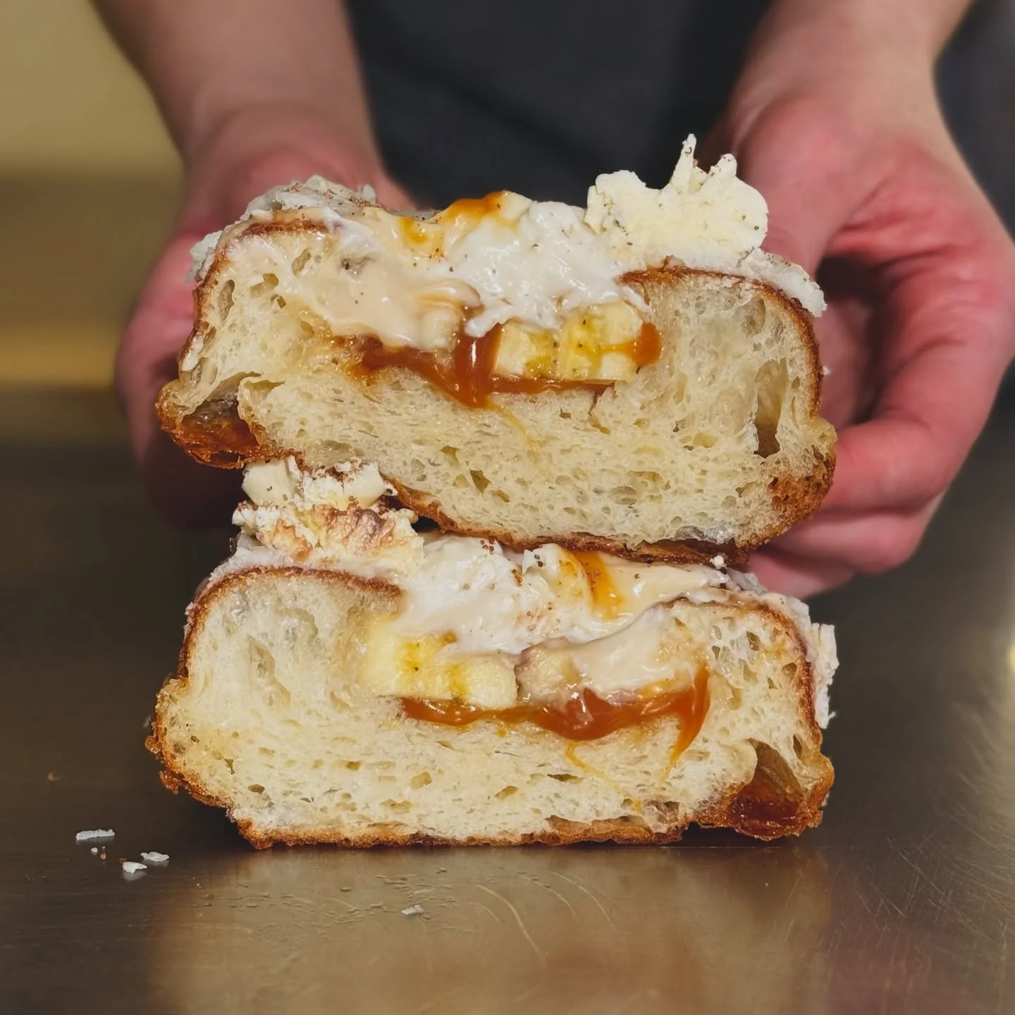 Banoffee Donut 🍌
Filled with silky cream, oozing salted caramel, and fresh bananas. Coated in vanilla glaze and finished with a dusting of shaved Whittaker&rsquo;s chocolate.

One of the classics we love bringing back - not only because they look be