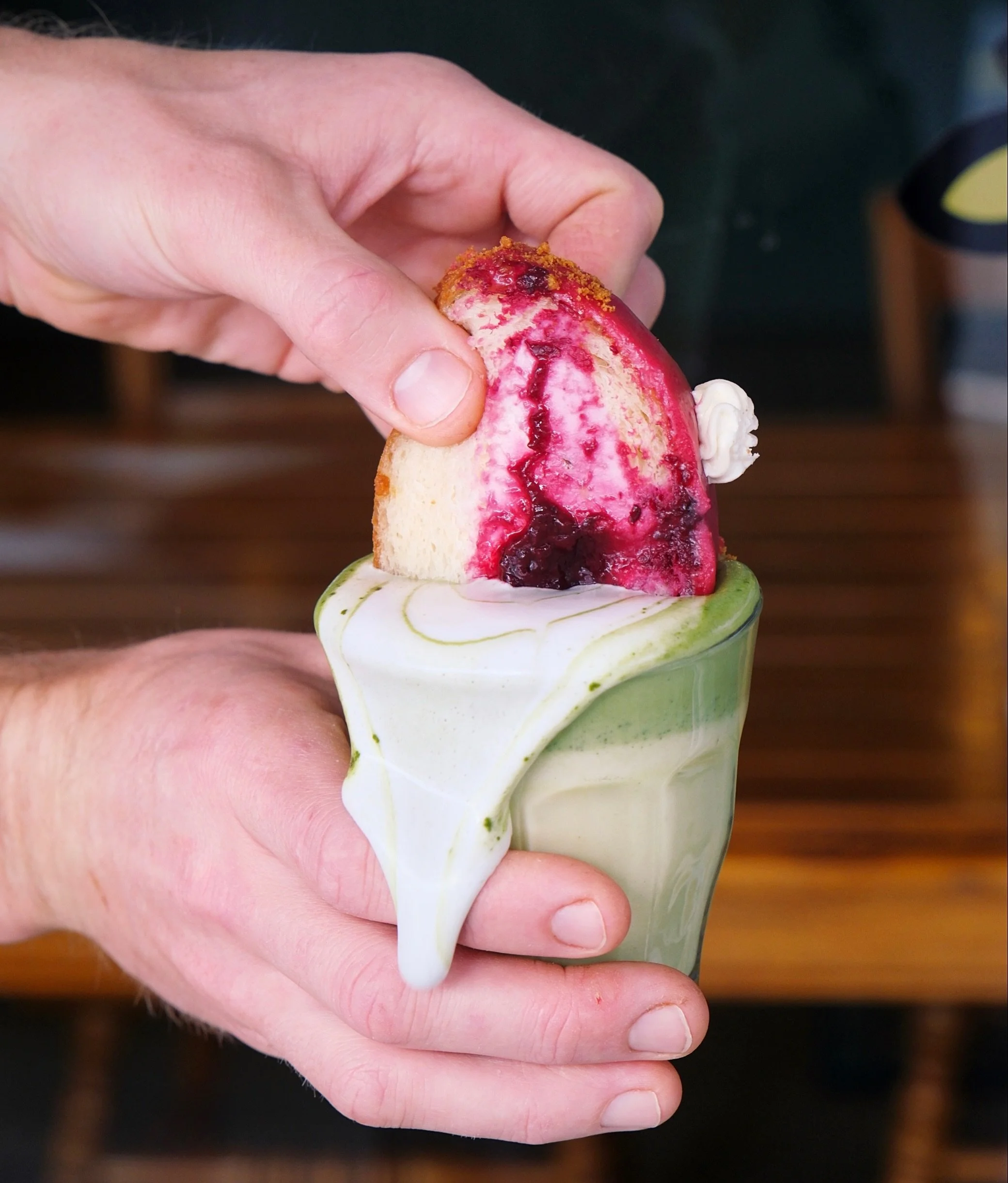 Pick a winner! 🏆

We may have taken the dunk a little too far 😂 You should&rsquo;ve seen our shoes after these shots!

💖Boysenberry Cheesecake Donut x Matcha Latte
OR
🤎Alfajor Dulce de Leche Donut x Mocha Latte 

So worth the mess! 

Which one ar
