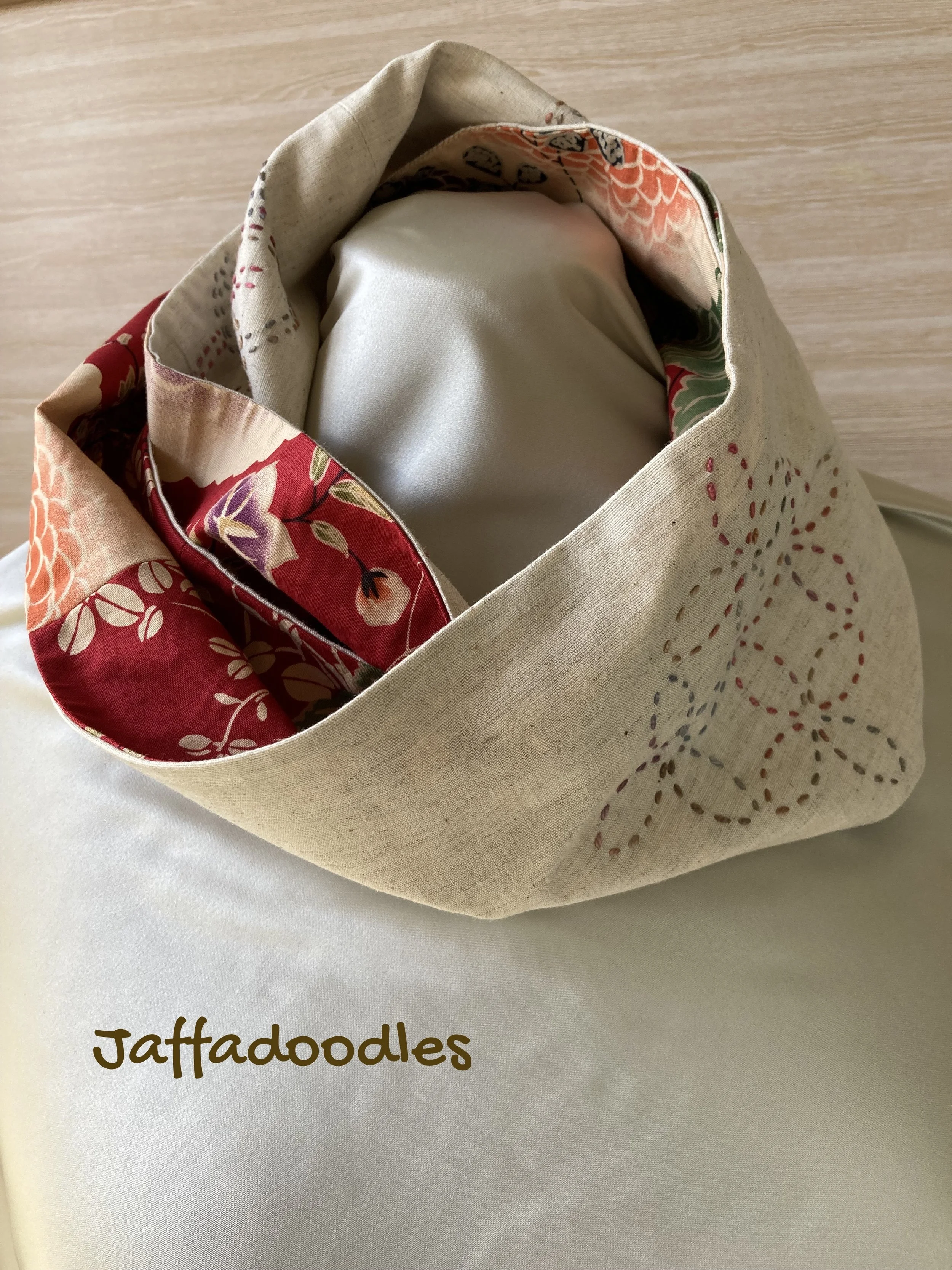 Cream mobius scarf.