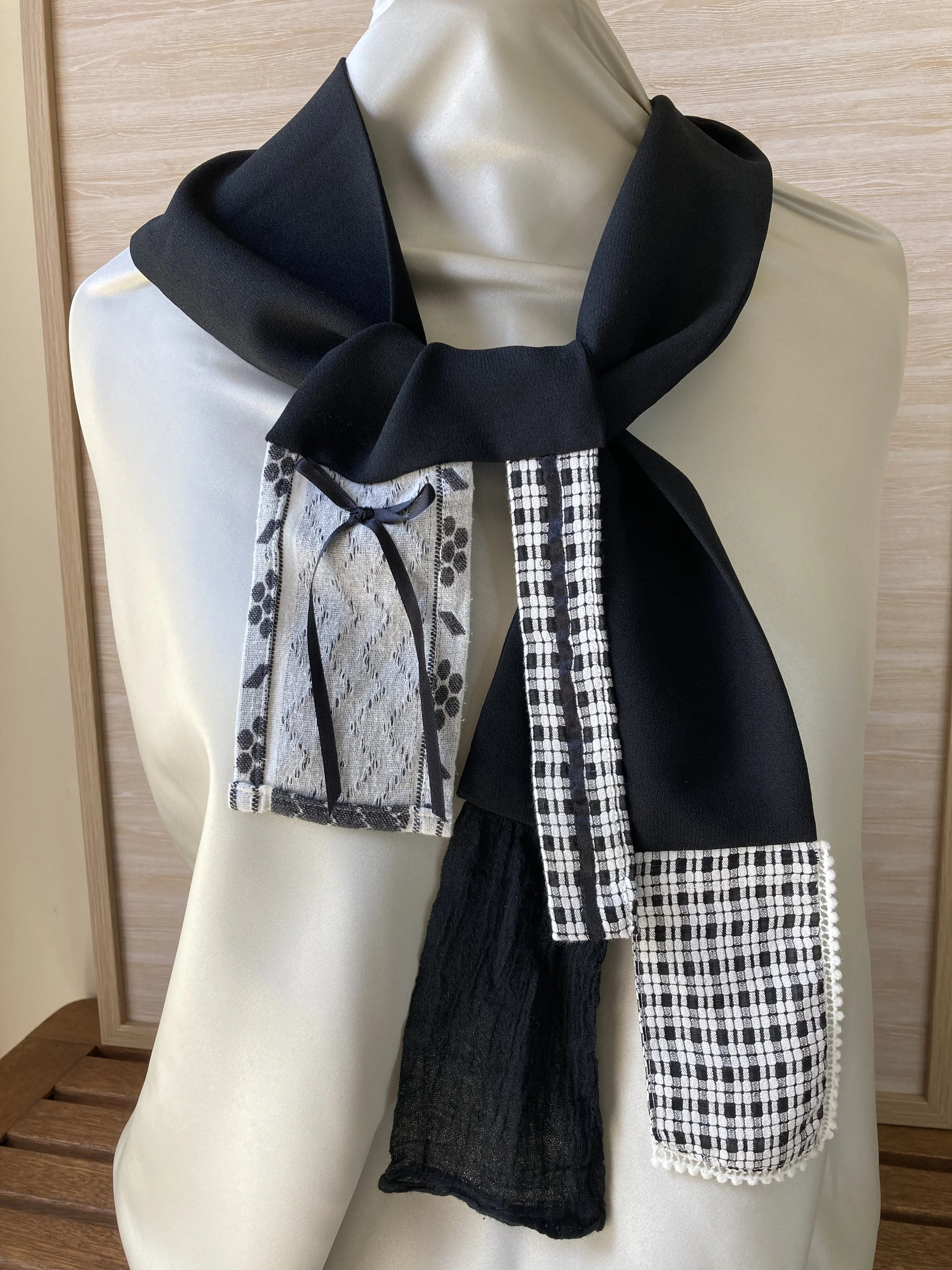 Black crepe scarf.