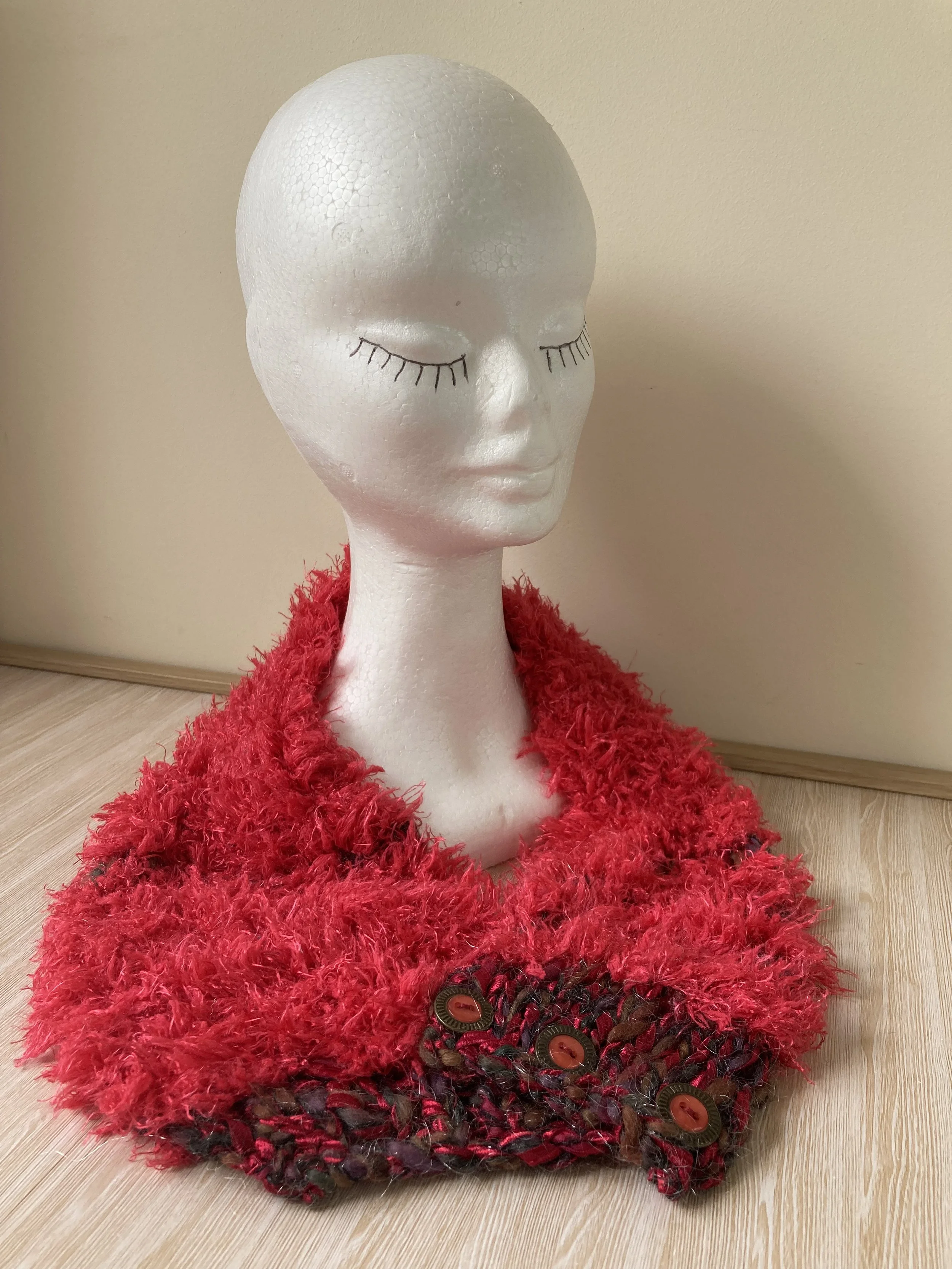 Red shiny scarf.