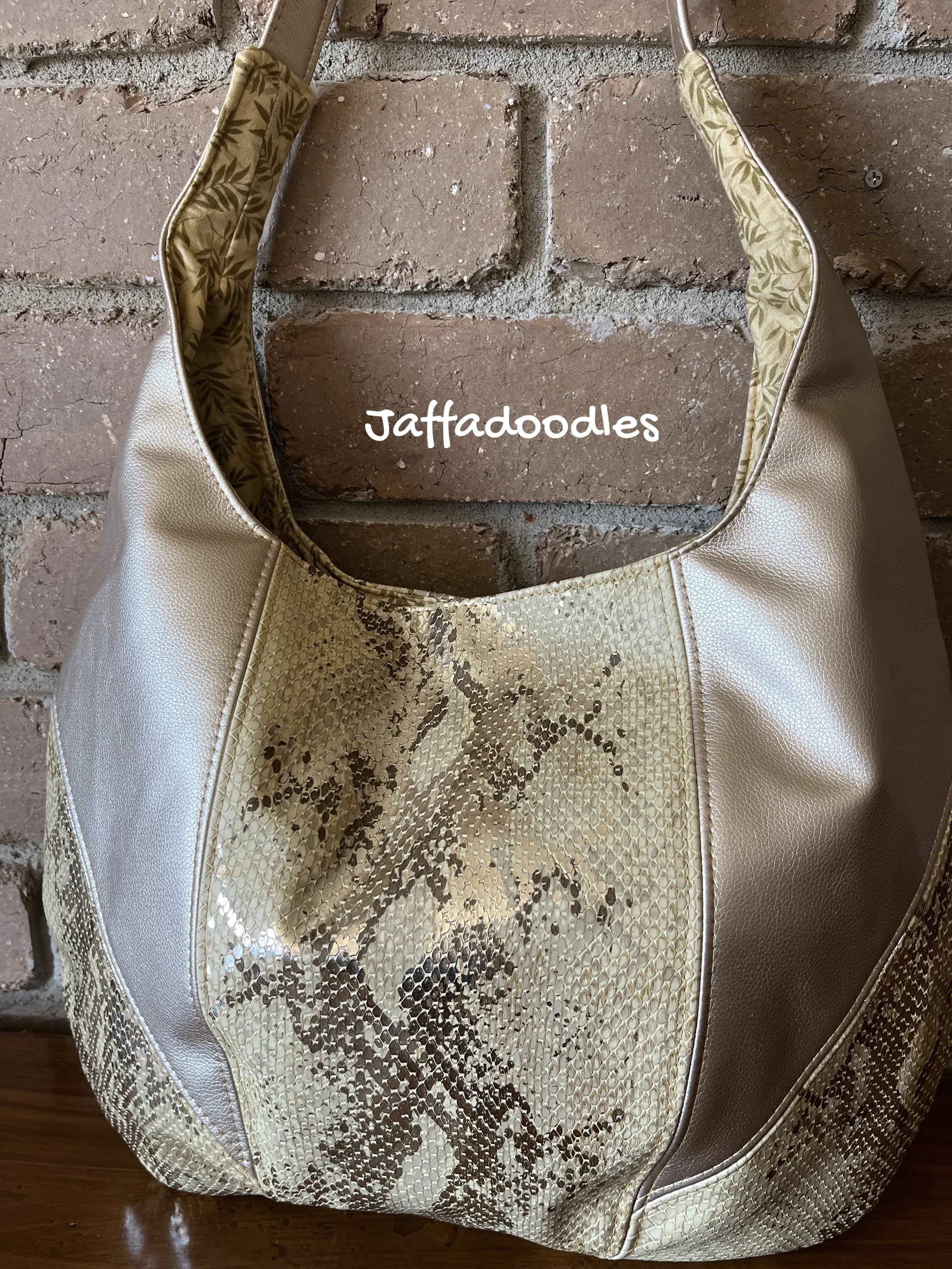 Snakeskin faux leather slouch bag
