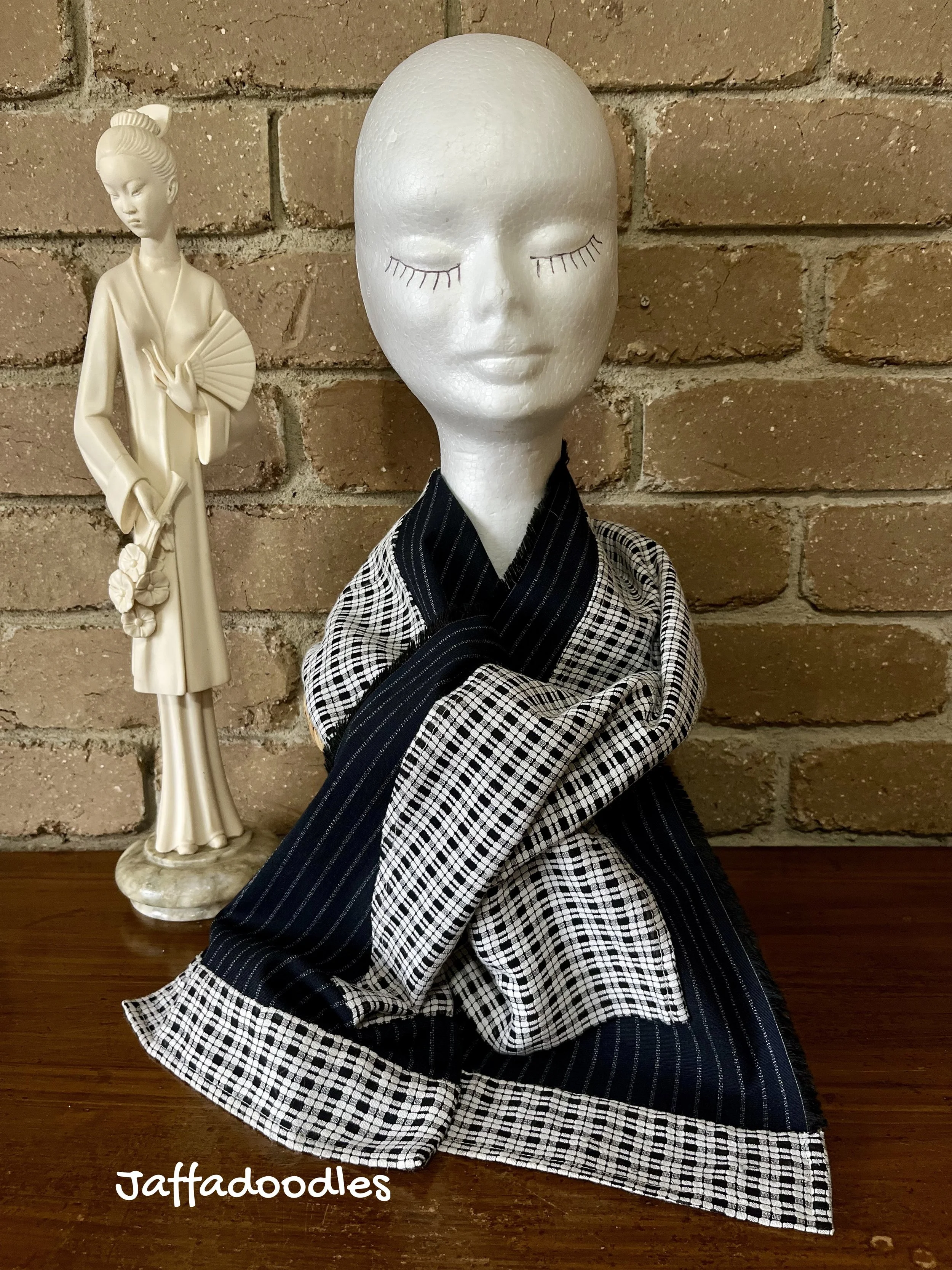 Black & white scarf.
