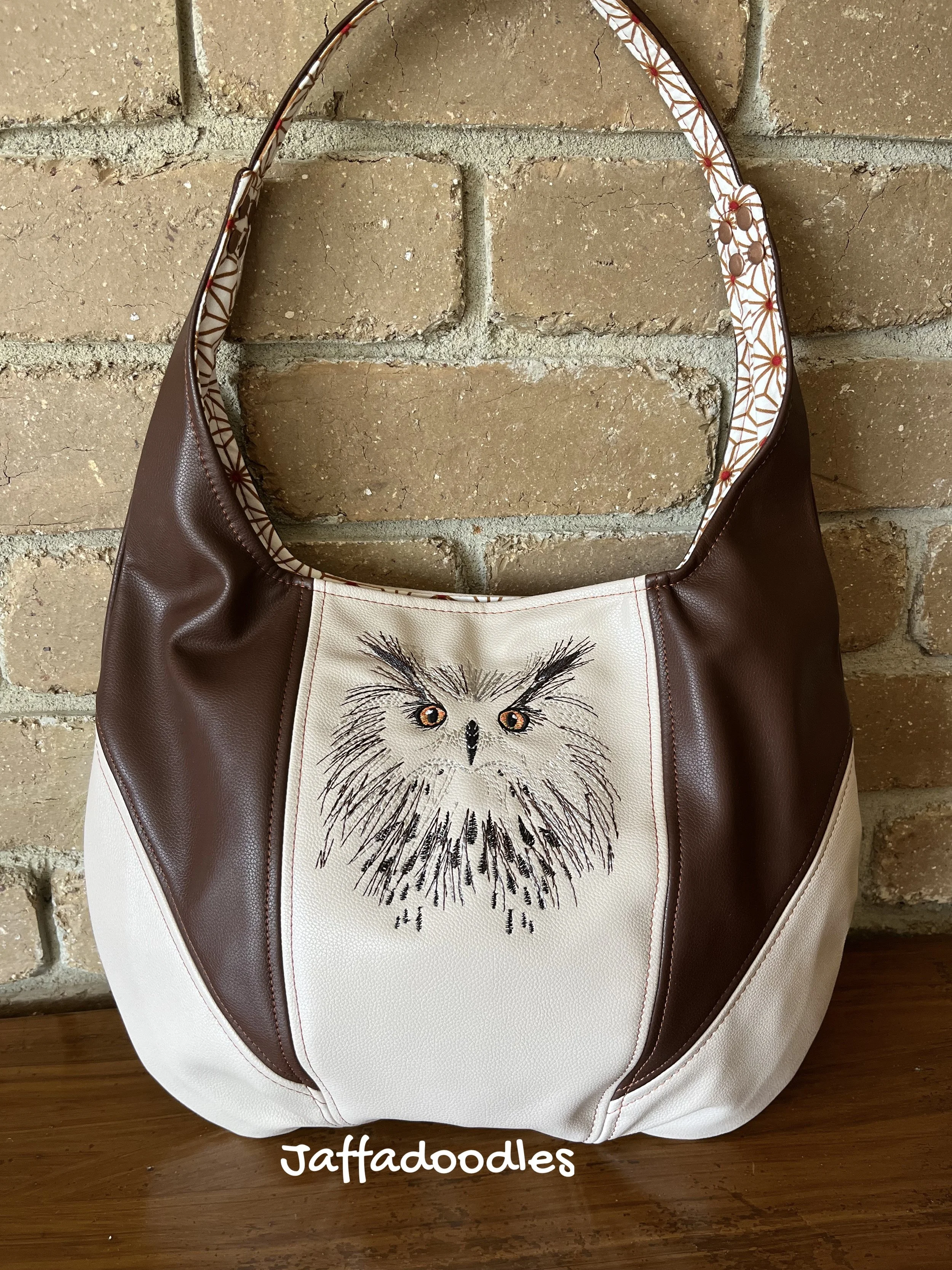 Owl slouch bag.