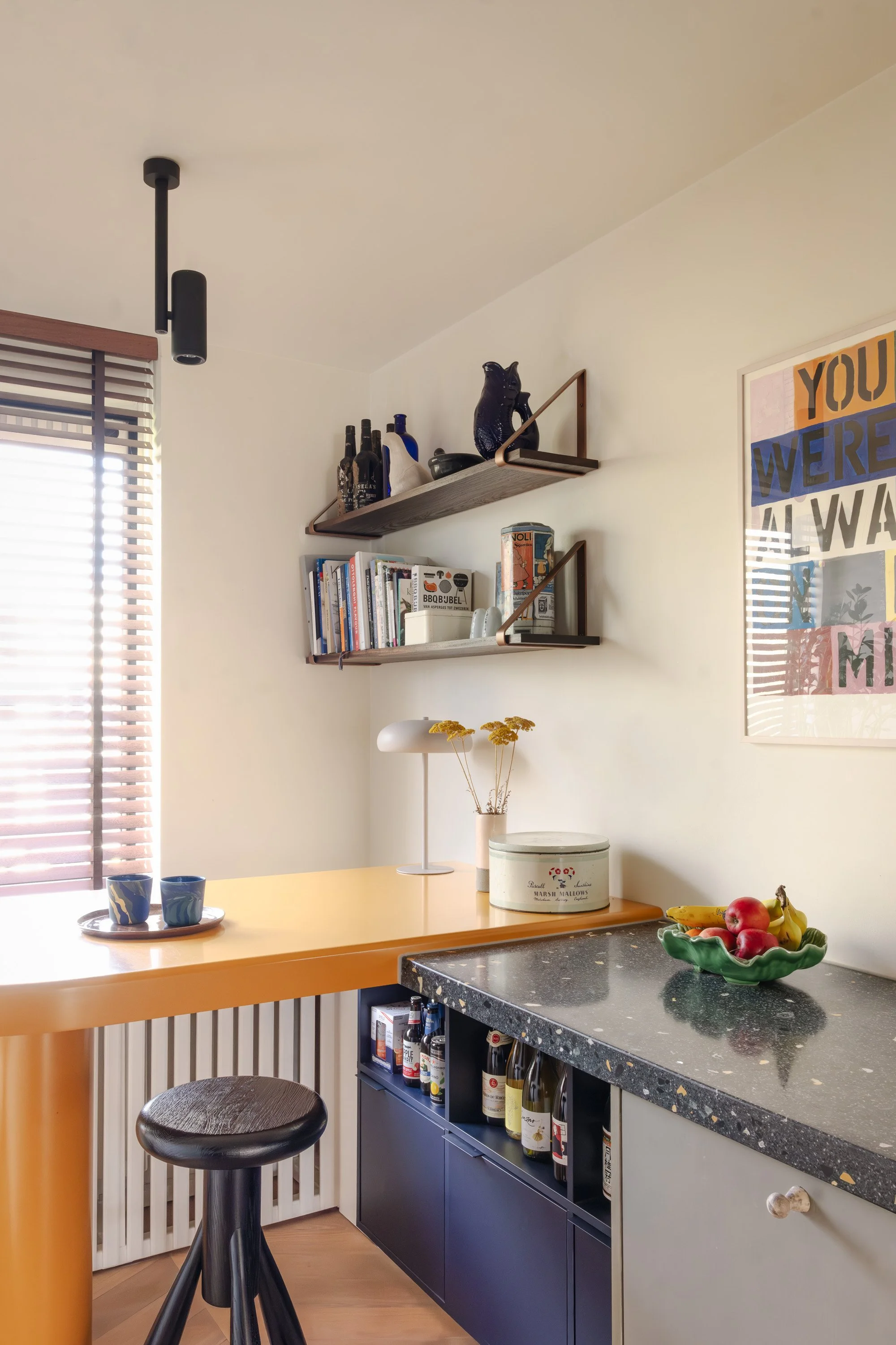 toby-robinson-interior-design-amsterdam-apartment-kitchen-yellow-bar-terrazzo.jpg