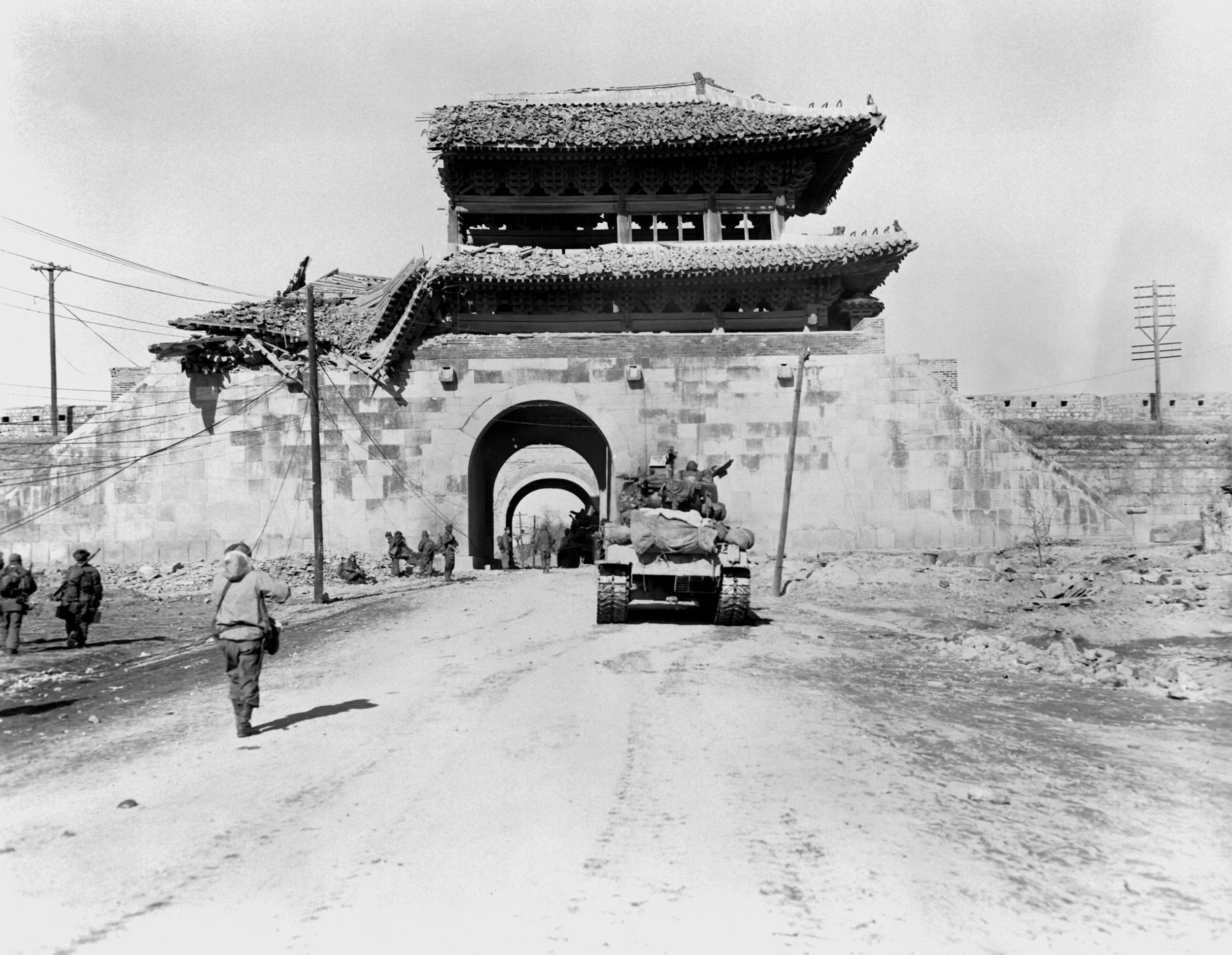 Damage to Namdaemun, a gate into the city of Seoul, Korea. 