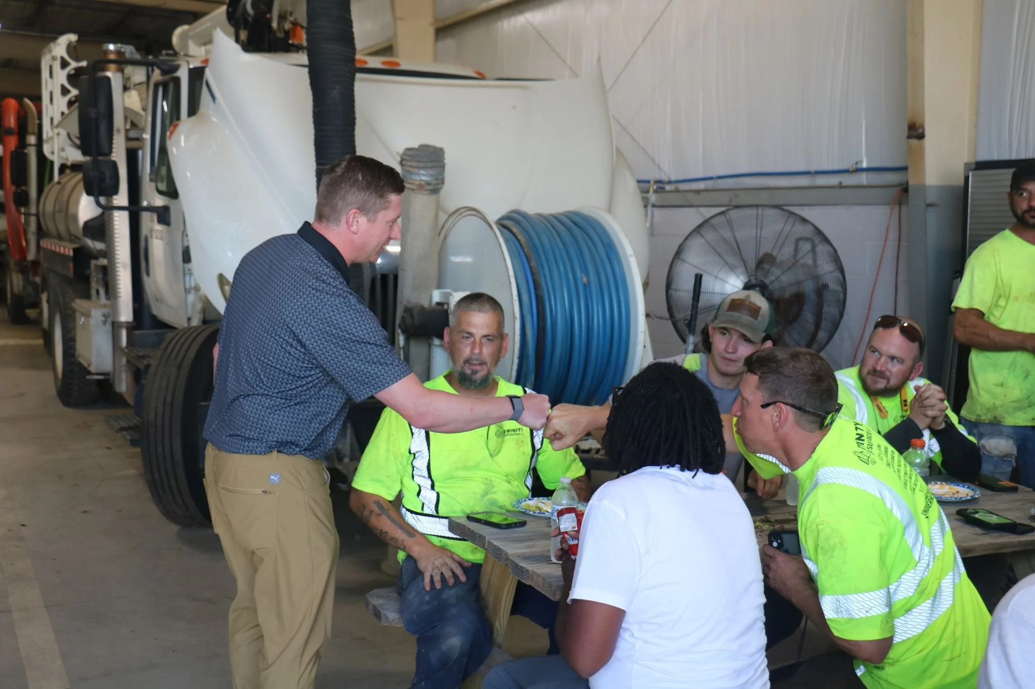 An image of Greg Finkle at a grill and chill event with the Trinity Subsurface team.