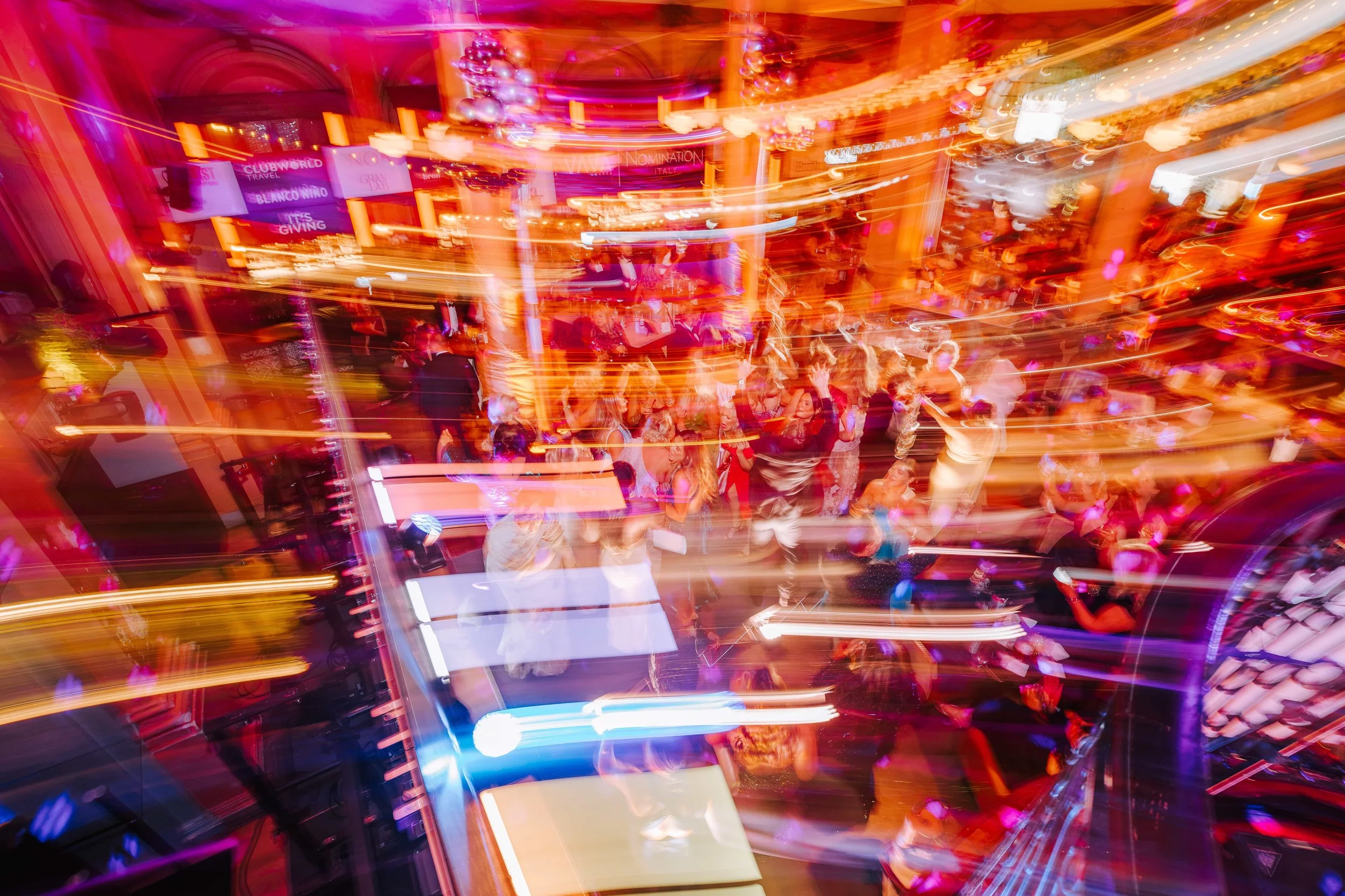 Long exposure of the dancefloor at the VAVA Influence Awards with streaks of coloured light