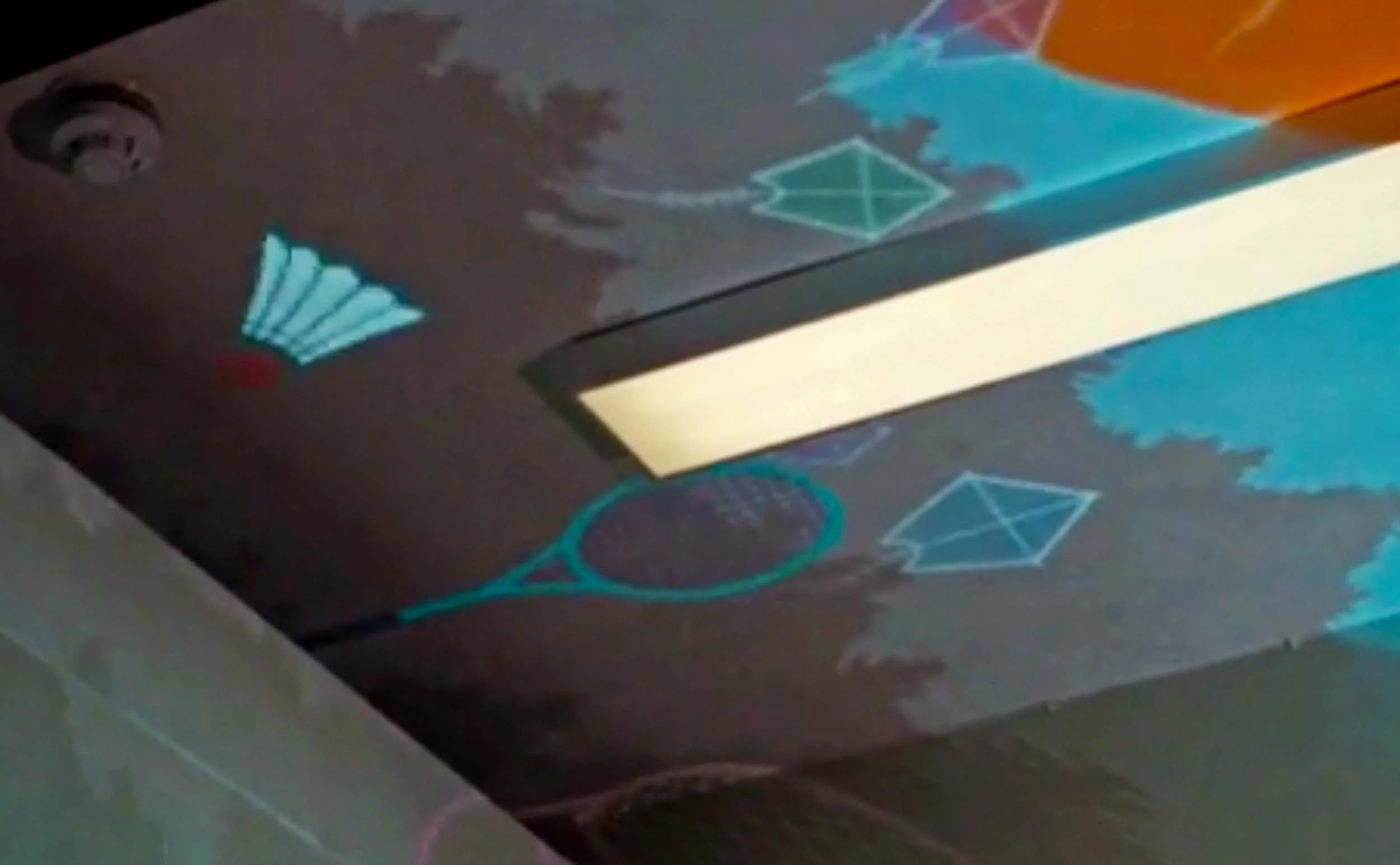 Museum ceiling projected with illustrations of everyday objects.