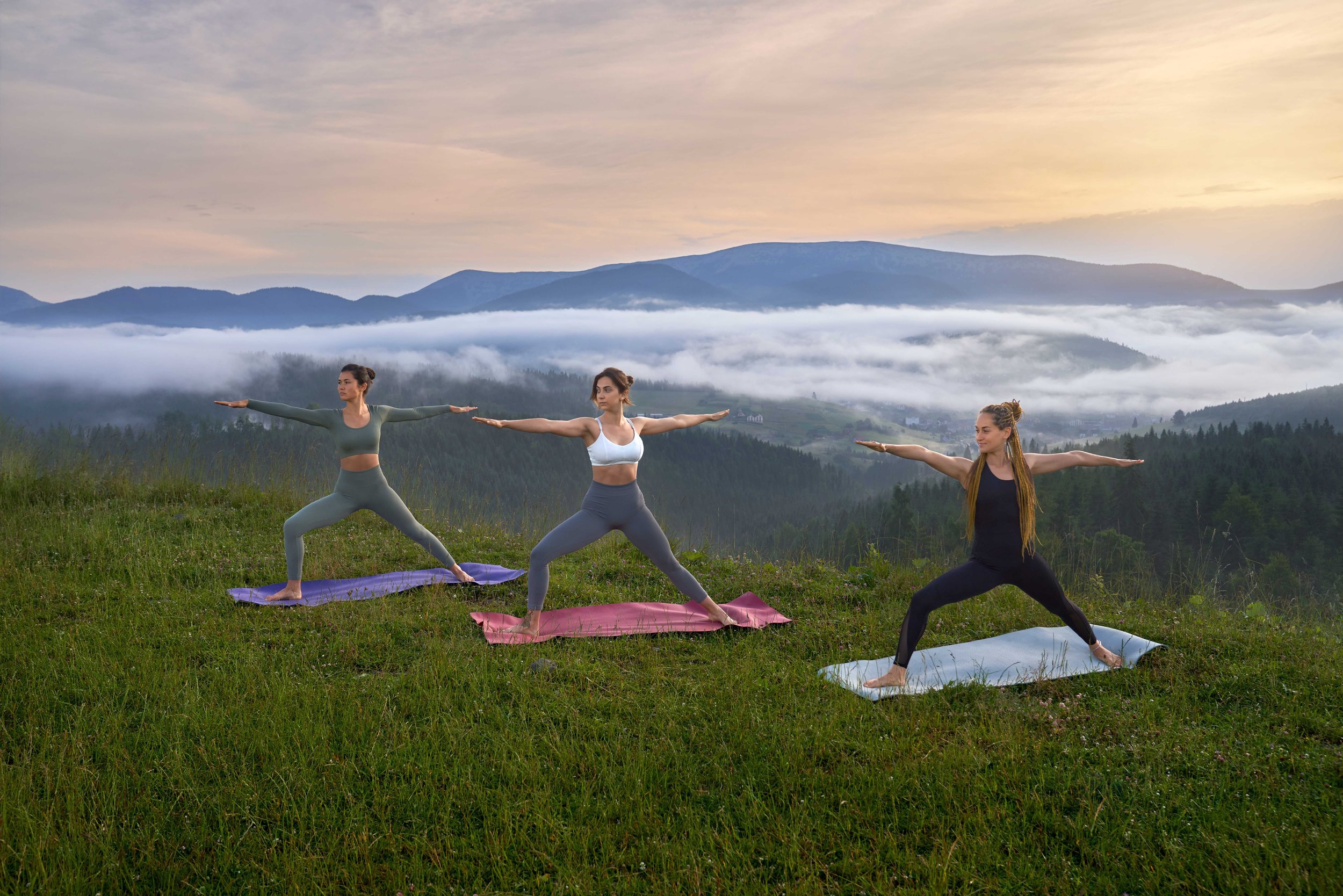 sporty-women-doing-yoga-exercises-nature.jpg